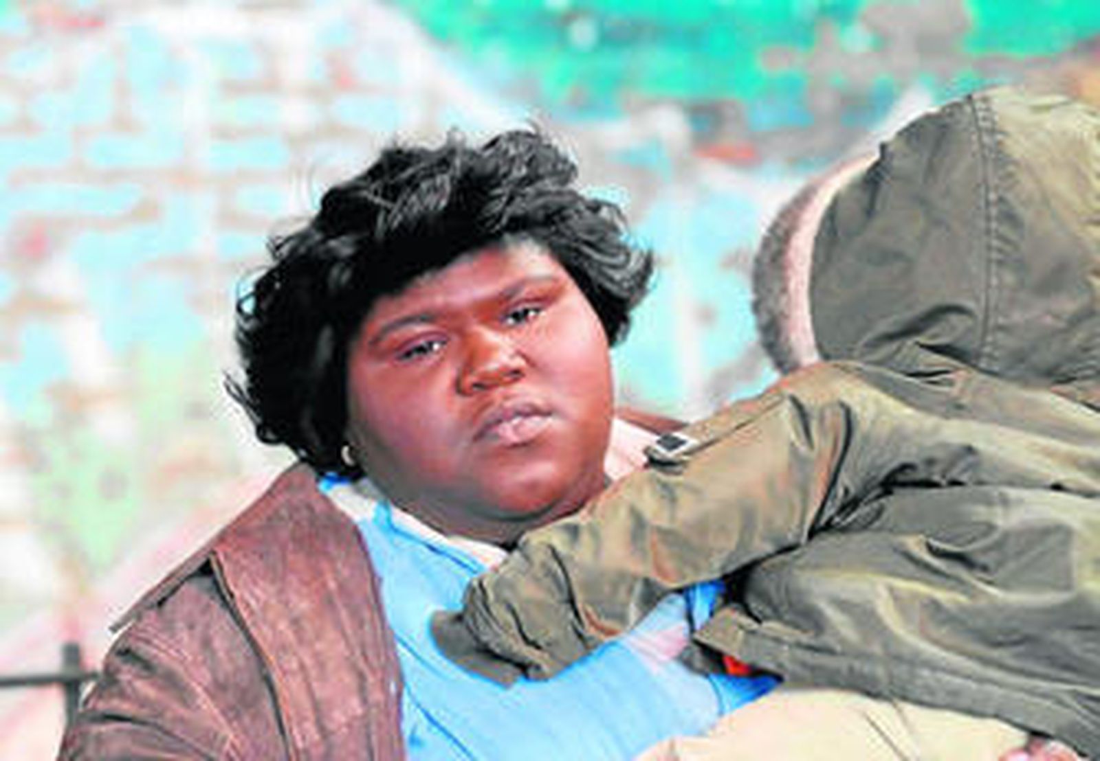 Precious (Gabourey Sidibe): gorda, analfabeta, madre de un hijo con síndrome de Down y seropositiva.