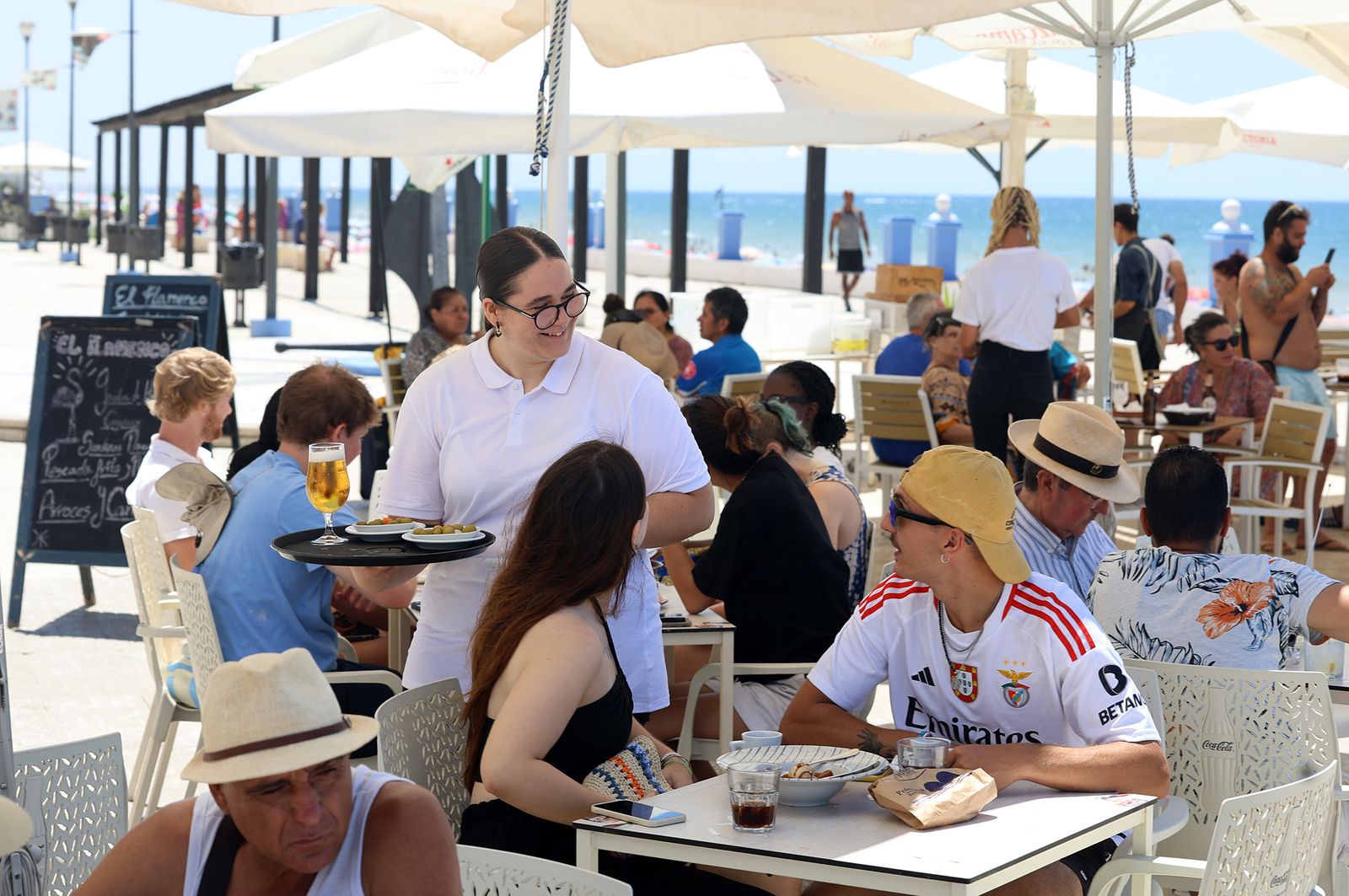 Imágenes de una mañana de calor y playa en Matalascañas