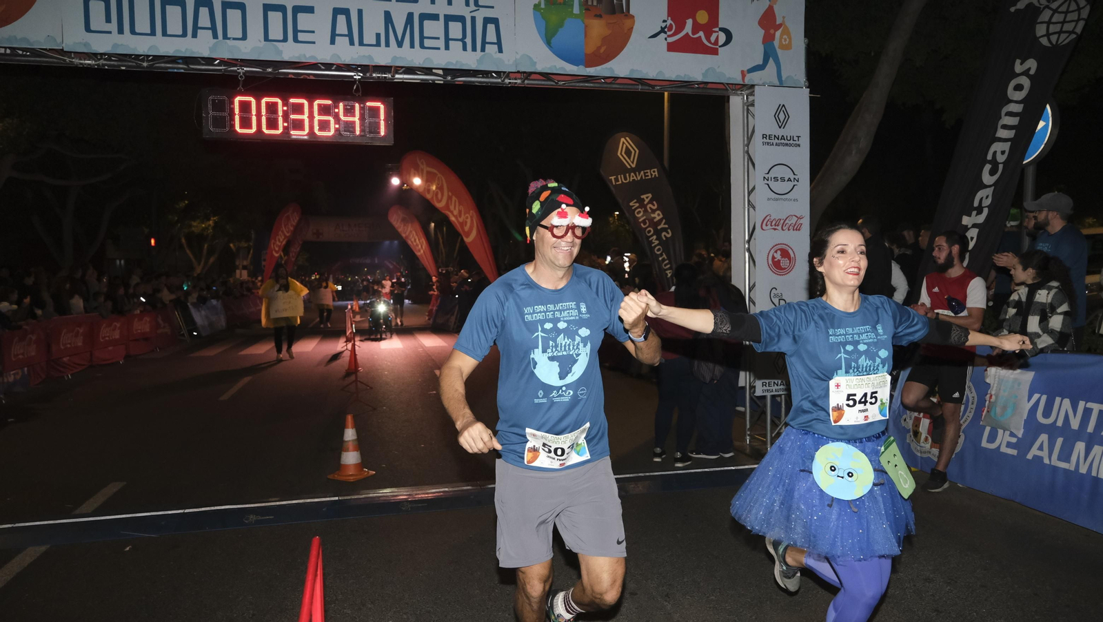 Imágenes de la XIV edición de la San Silvestre de Almería