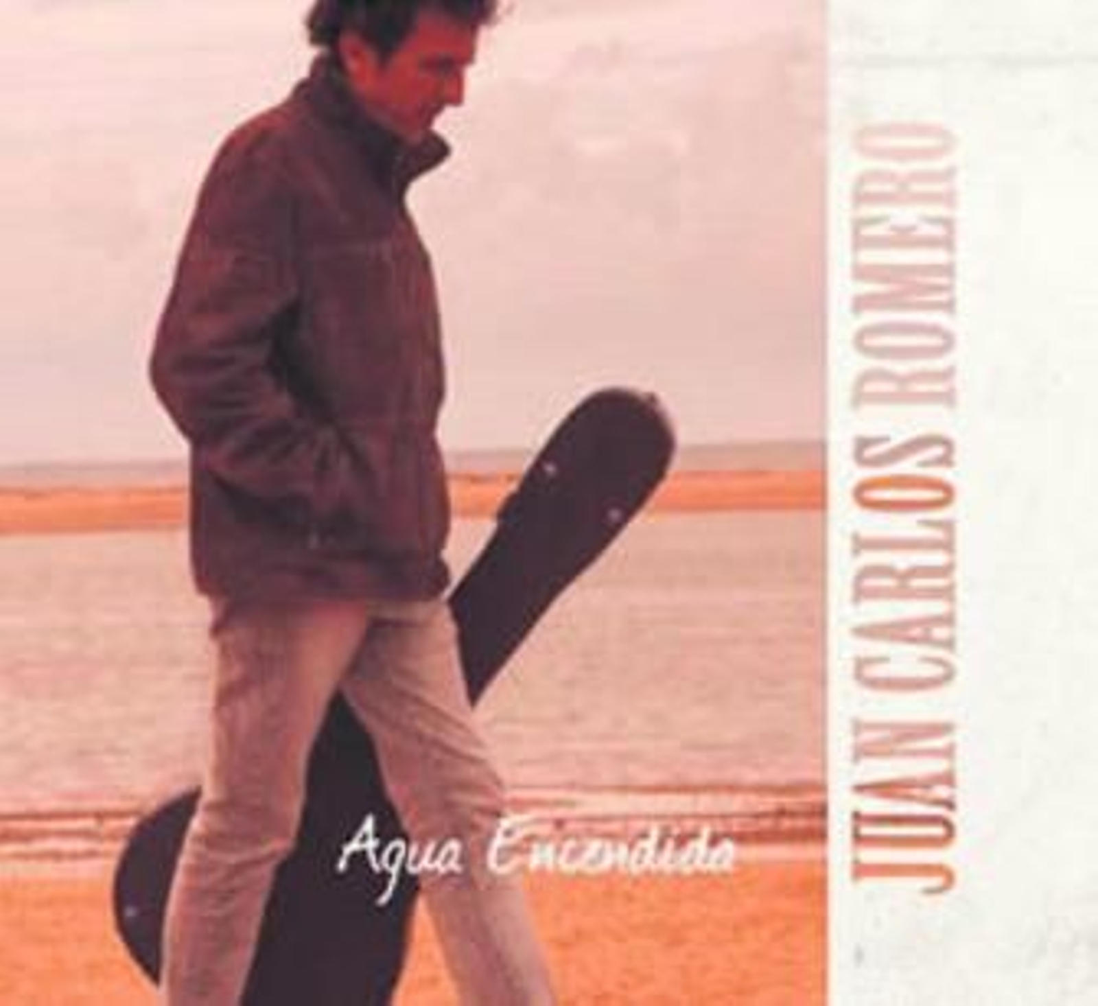 El tocaor Juan Carlos Romero, acompañando a su paisano, el cantaor Arcángel. El tocaor Juan Carlos Romero, acompañando a su paisano, el cantaor Arcángel.