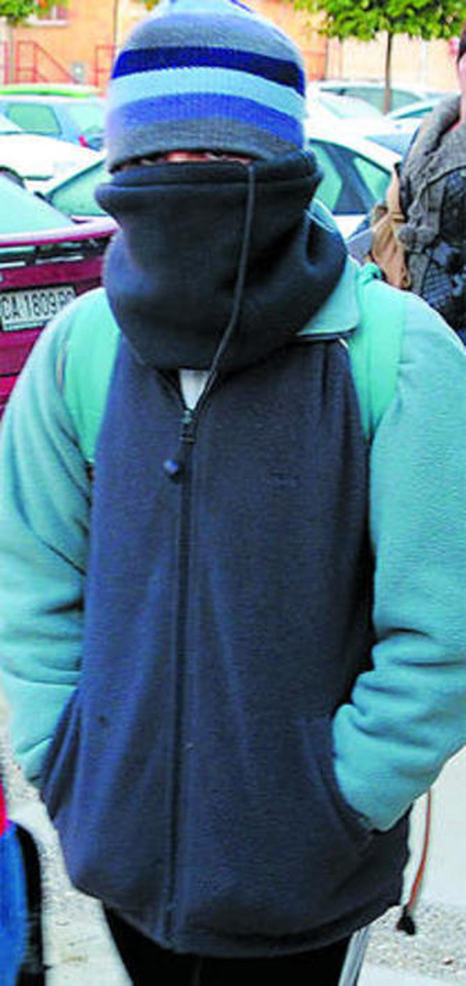 Un alumno muy abrigado.