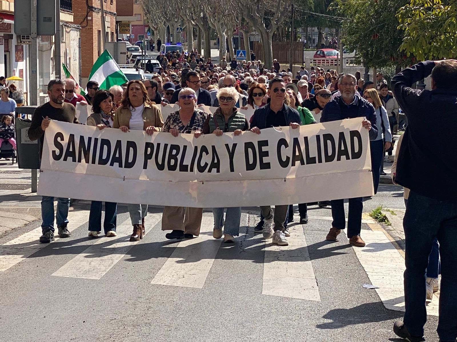Los manifestantes a su paso por el barrio de Capuchinos