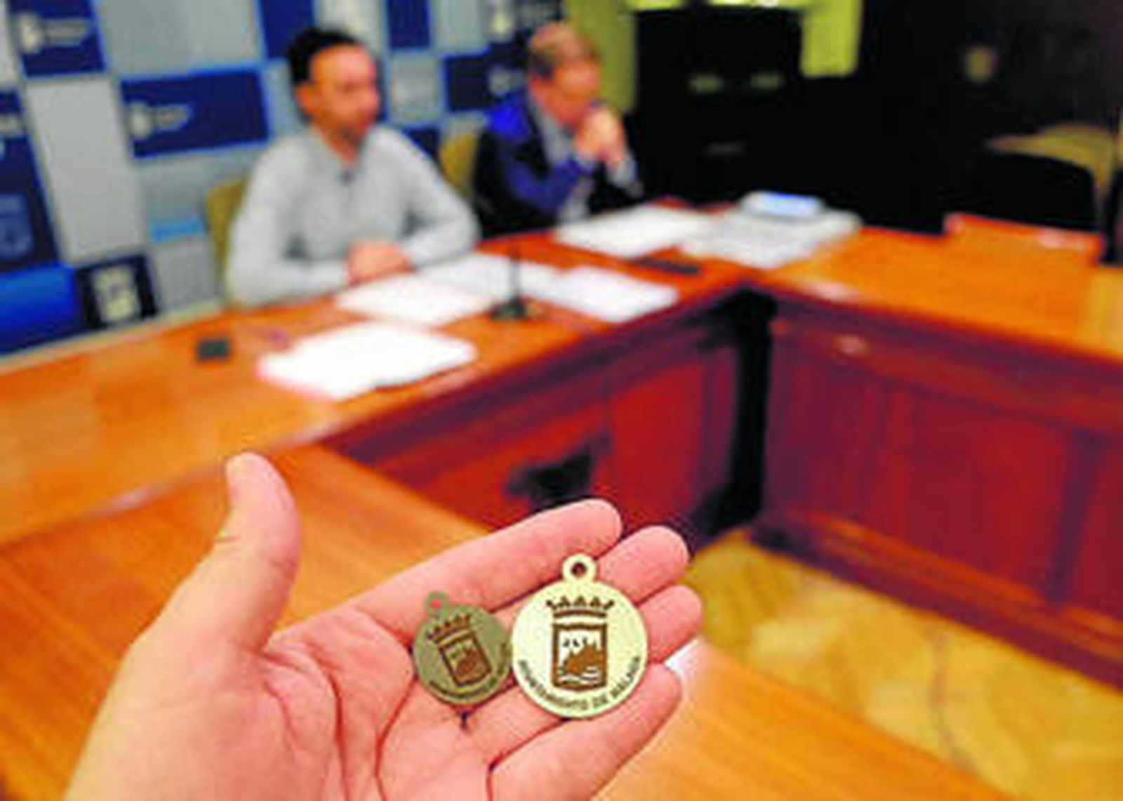 Imagen de las chapas para los collares de los animales.