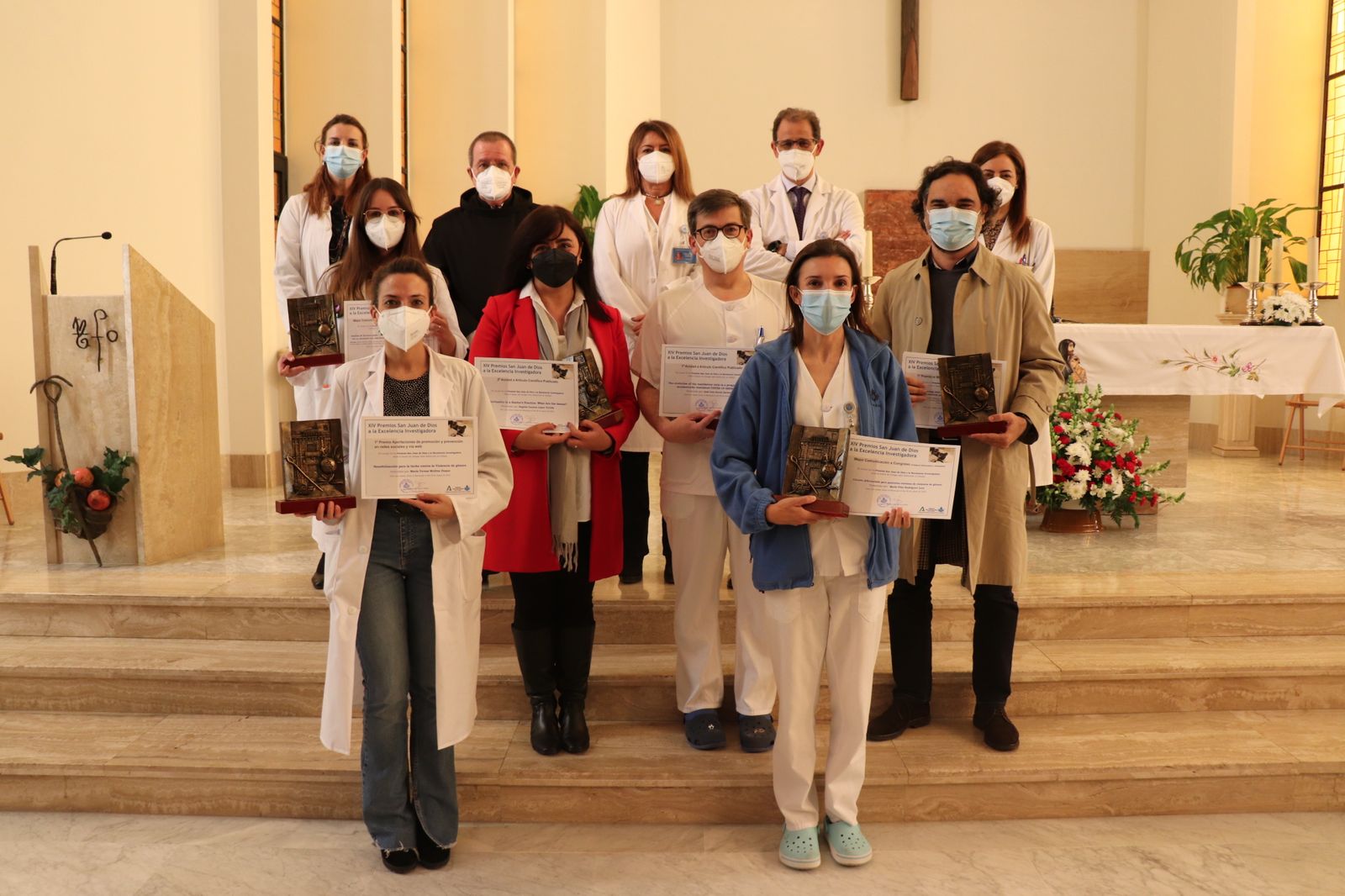 Foto de familia de los premiados.