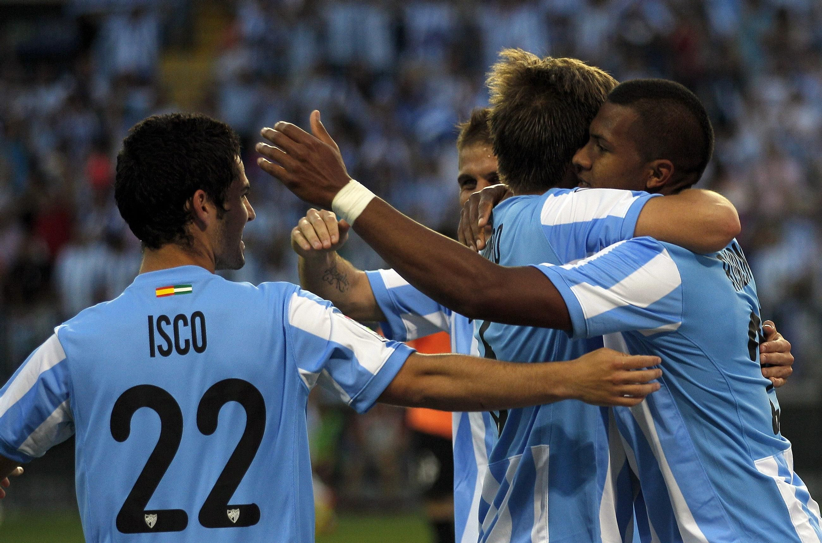 Rondón celebra con Isco, Camacho y Joaquín
