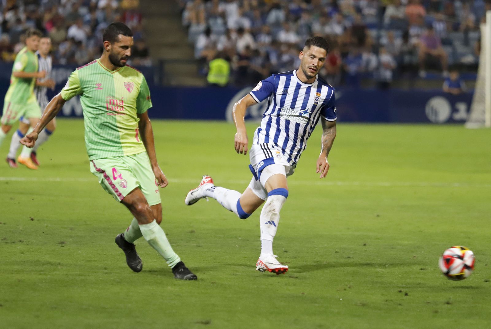 Imágenes del encuentro entre el Recreativo de Huelva y el Málaga