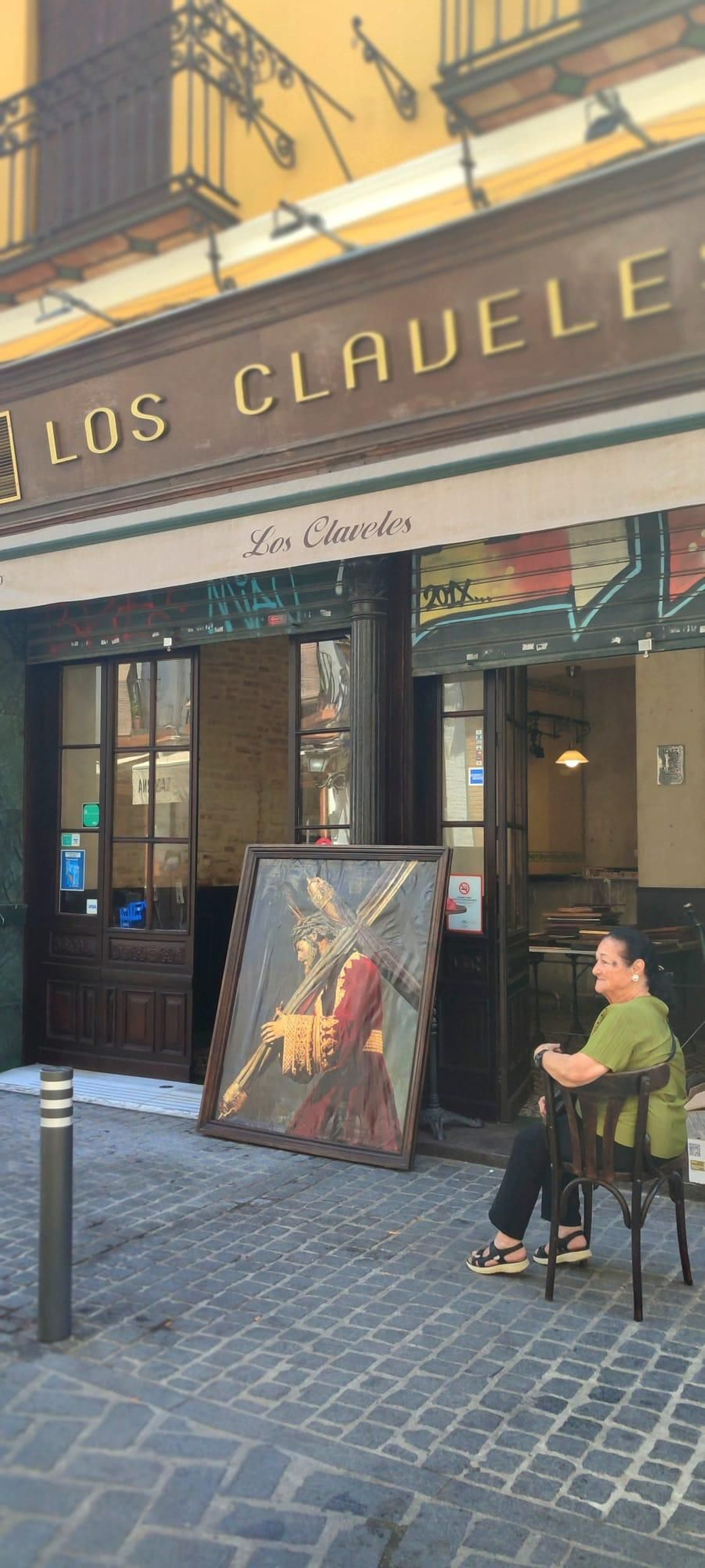 El cuadro del Gran Poder en la puerta del establecimiento