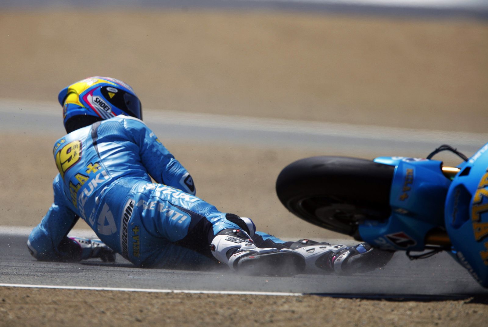 El piloto de Suzuki MotoGP Álvaro Bautista en el momento de la caída en el Gran Premio de Laguna Seca.

Foto: DAVID ROYAL.