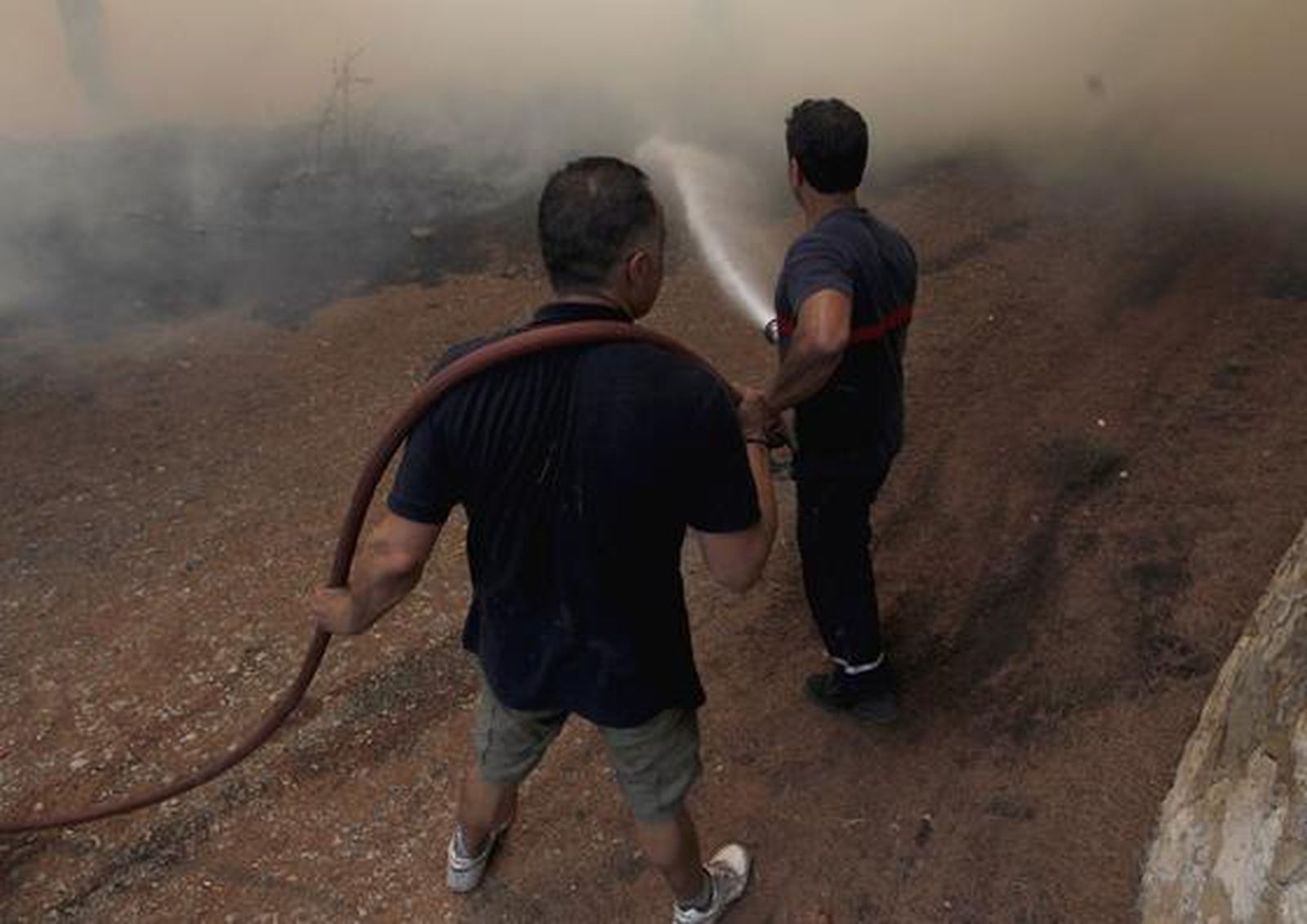 El fuego arrasa miles de hectáreas en comarcas del interior de la provincia de Valencia.

Foto: Reuters
