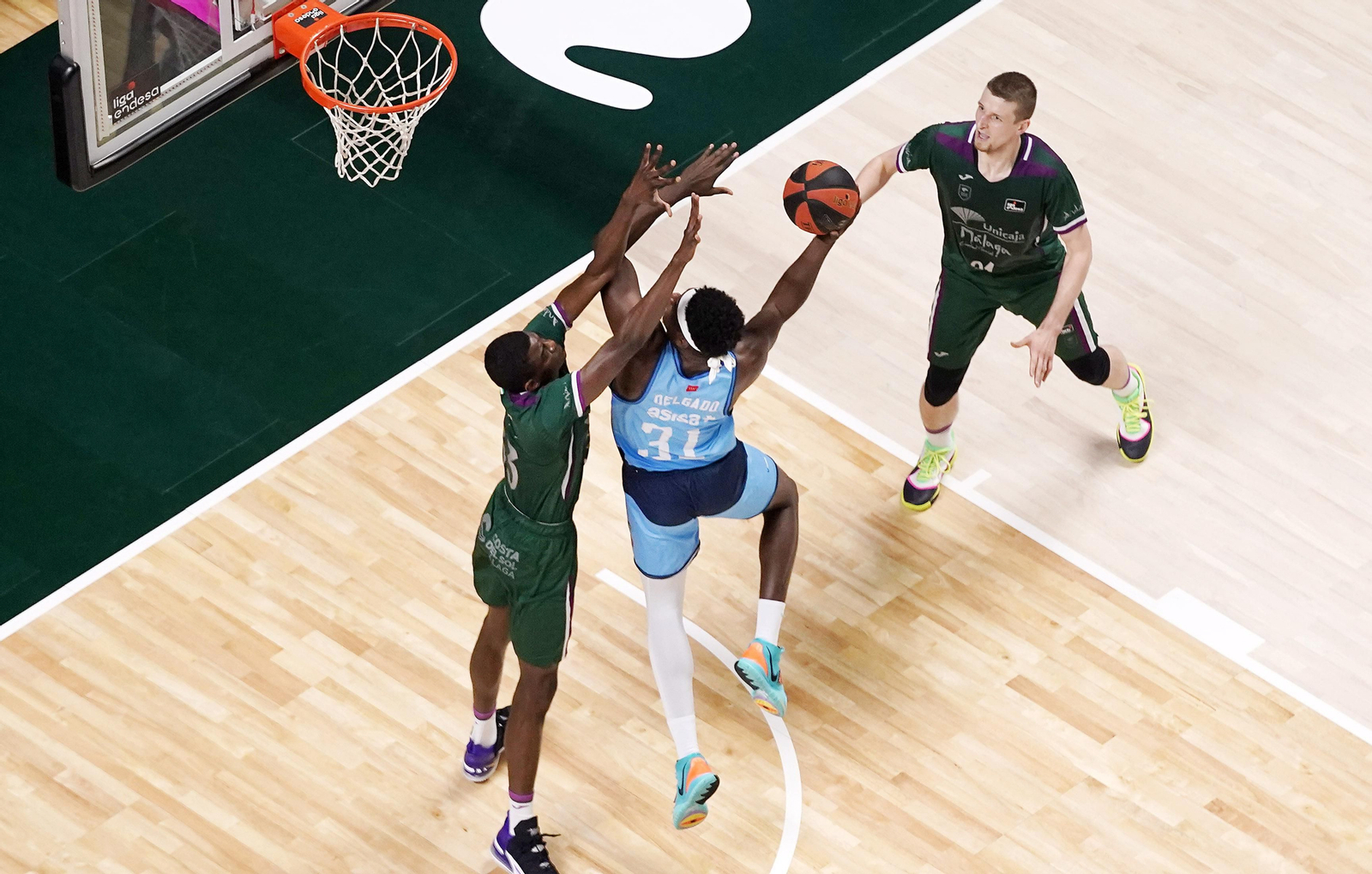 Los cinco años de Adam Waczynski en el Unicaja, en fotos