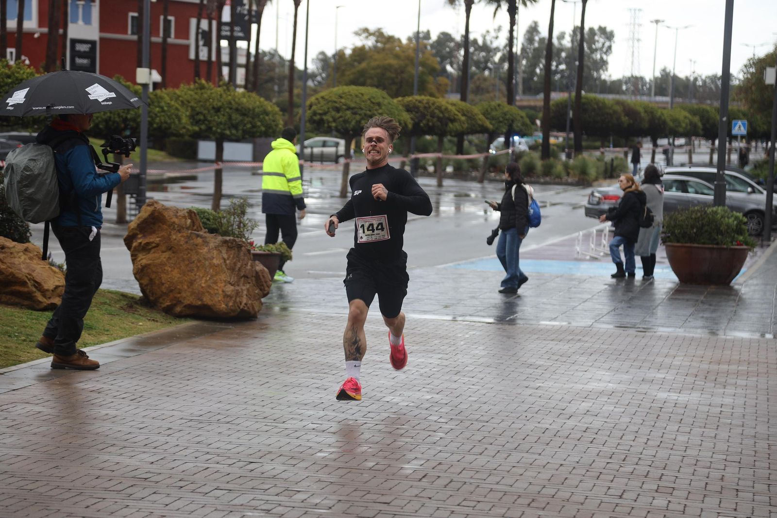 La Carrera por el Día Internacional de la Mujer en Málaga, en fotos