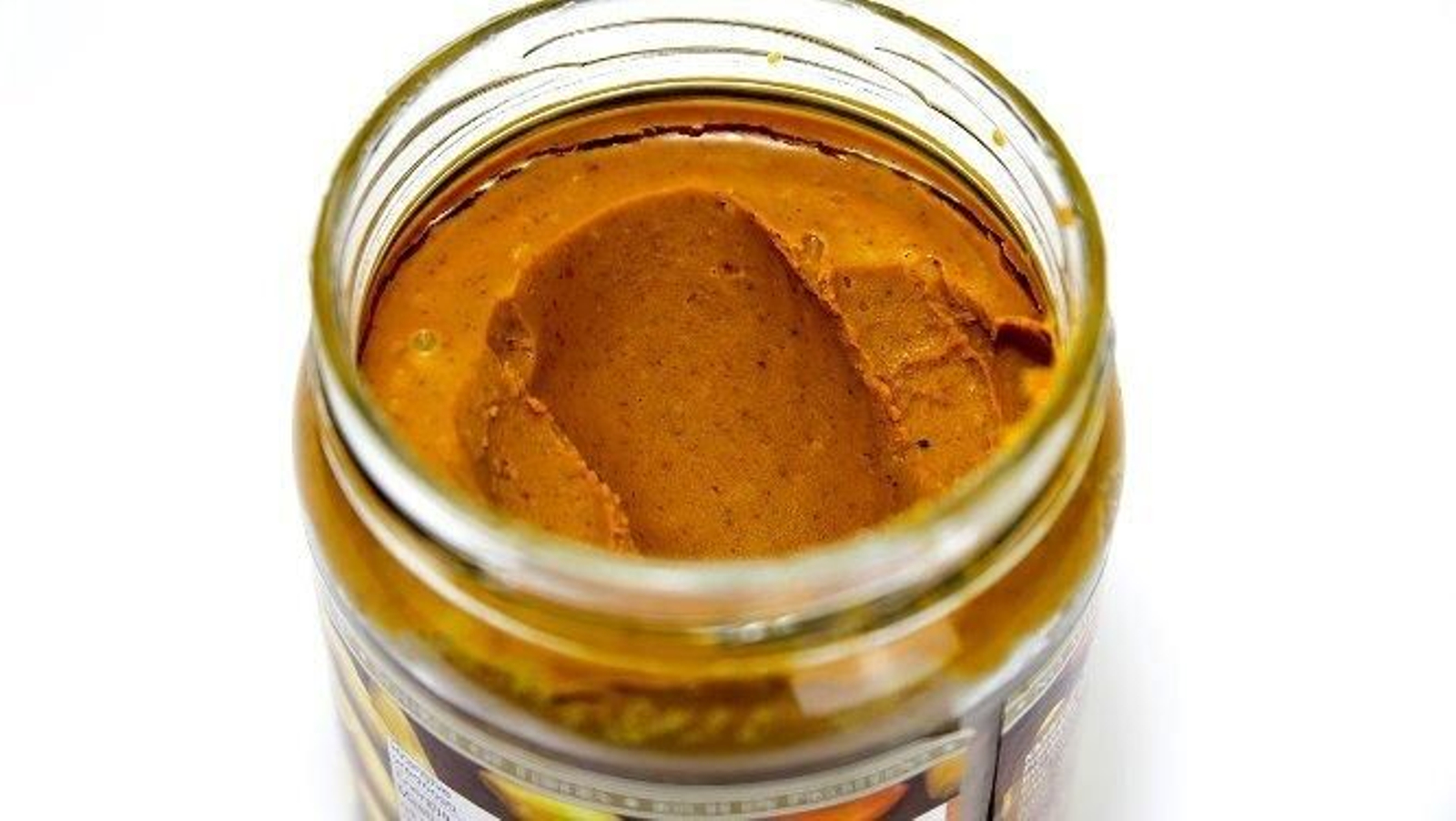 Un bote de mantequilla de cachuete.