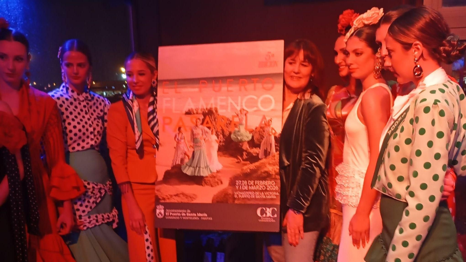 Claudia Bautista y Olga de Navas, preentando el cartel.