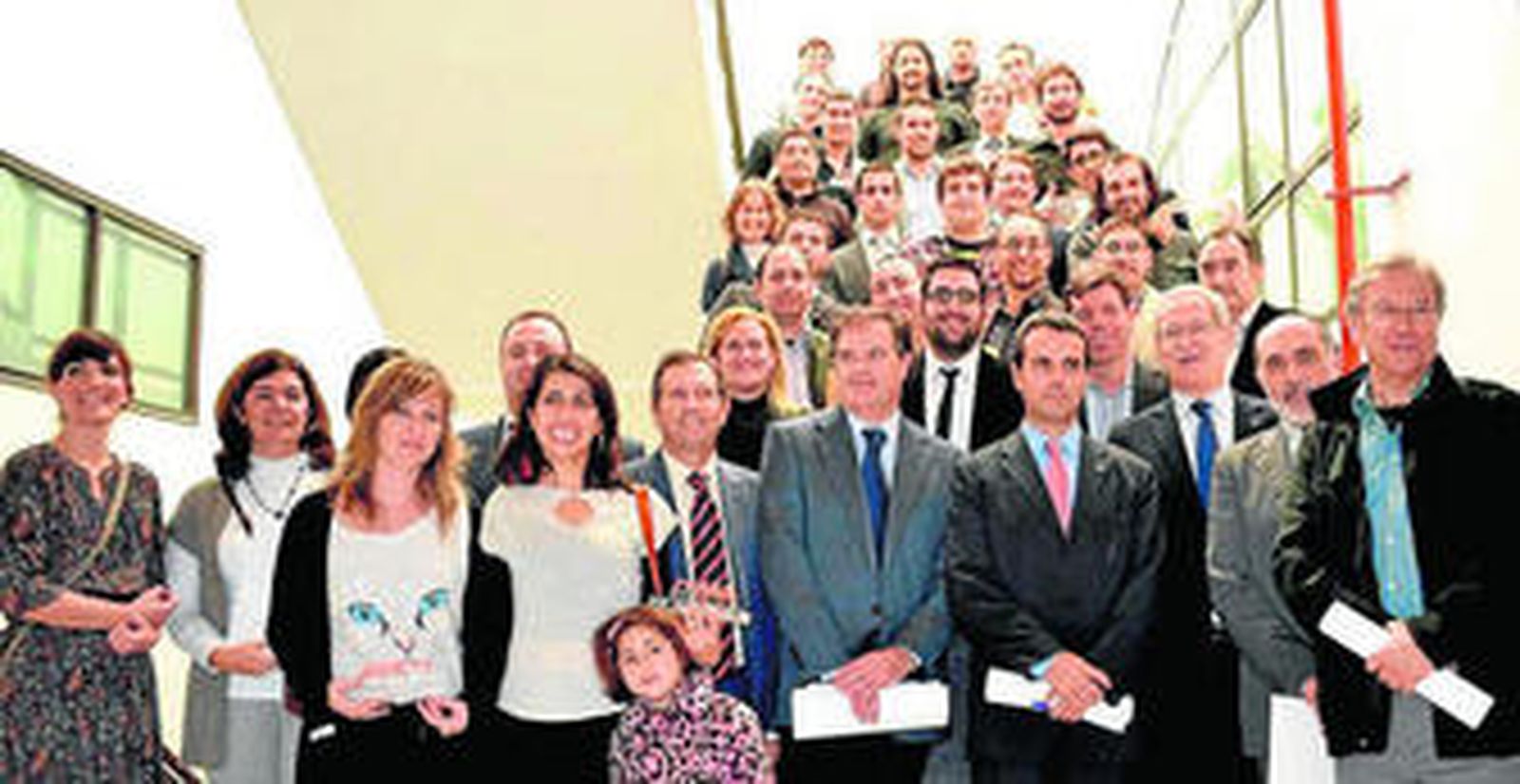 Foto de familia de los premiados.