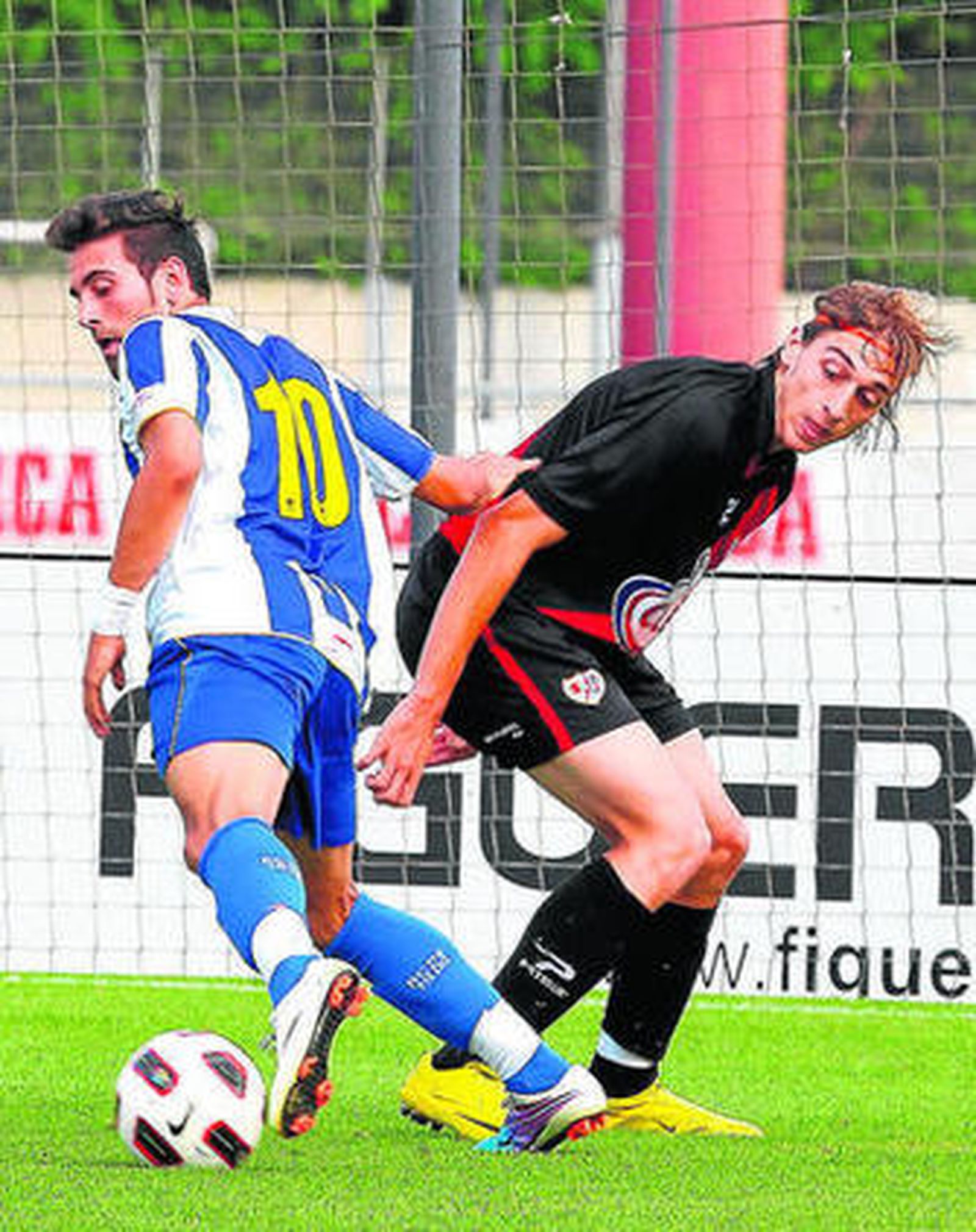 Pirulo, a la izquierda, durante un partido con el Espanyol.