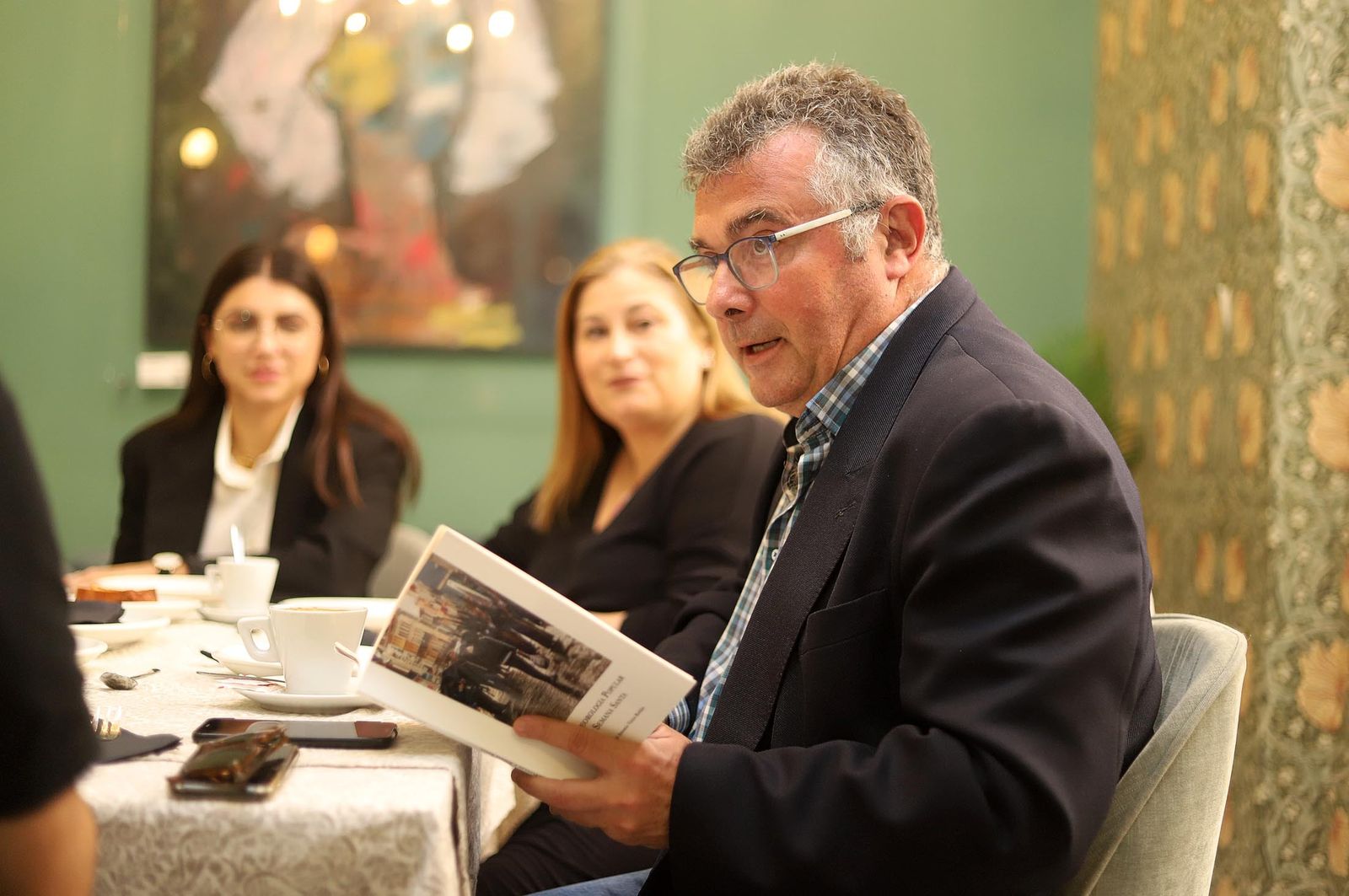 Imágenes de la tertulia cofrade "El Aguaó" de Huelva Información