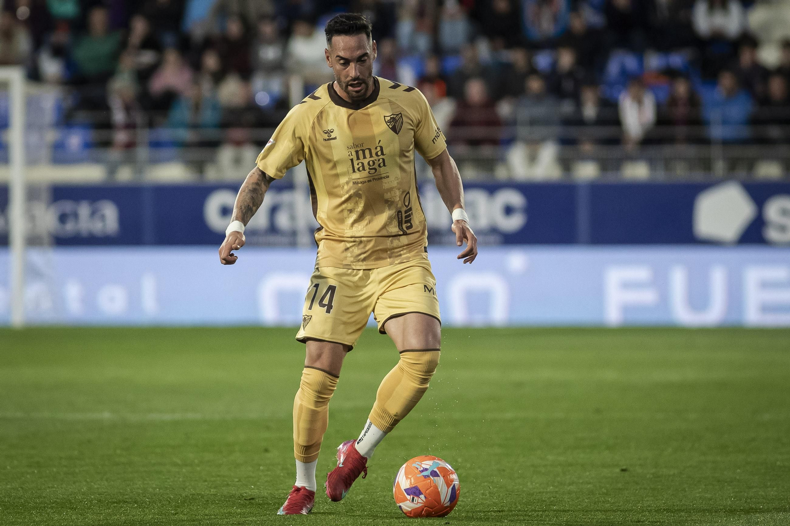 El Huesca-Málaga CF, en fotos