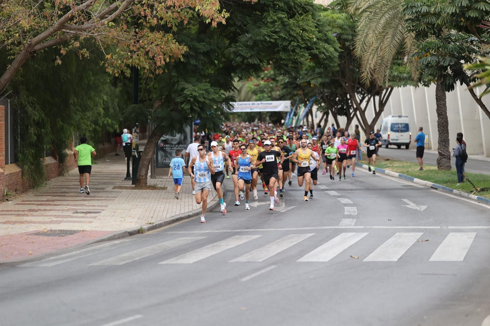 Las fotos de la VIII Carrera de la Prensa y la IV Marcha Solidaria de Málaga
