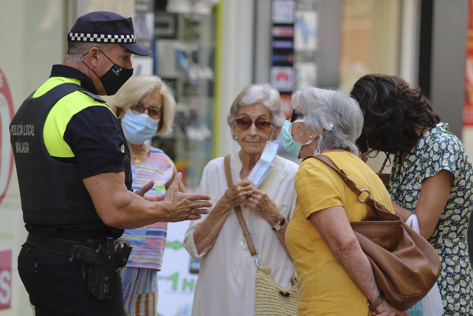Fotos del primer día de mascarillas obligatorias en las playas y el Centro de Málaga