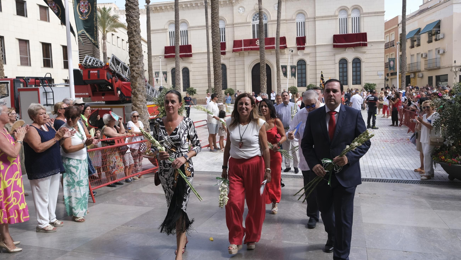 Ofrenda floral a la Virgen del Mar en la Feria de Almería 2024, en imágenes