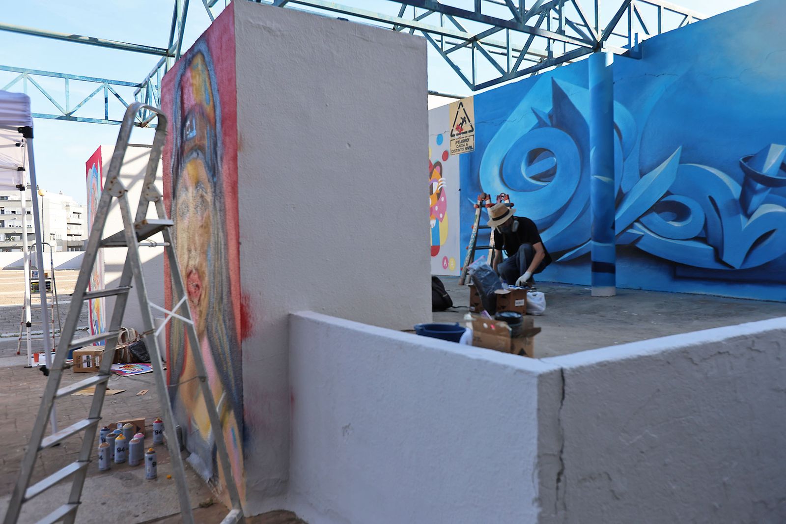 Imágenes de la muestra de arte urbano en la Plaza del Titan de Huelva
