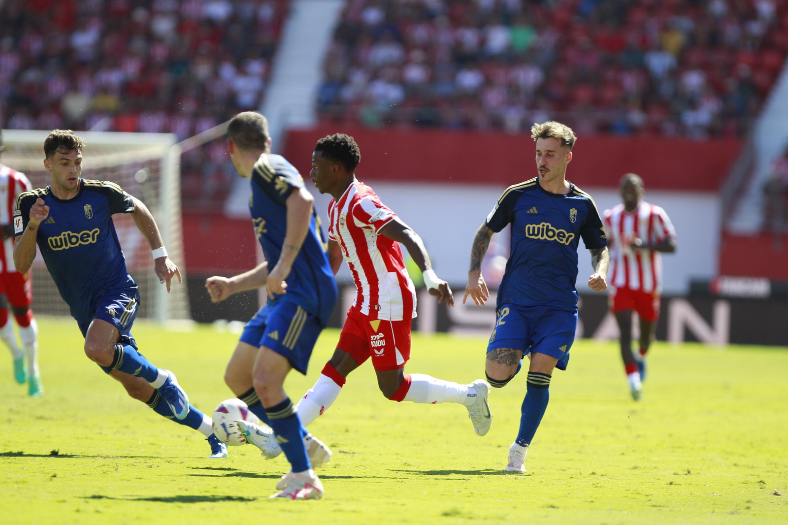Imágenes del empate a 3 de la U.D. Almería y el Granada C.F.