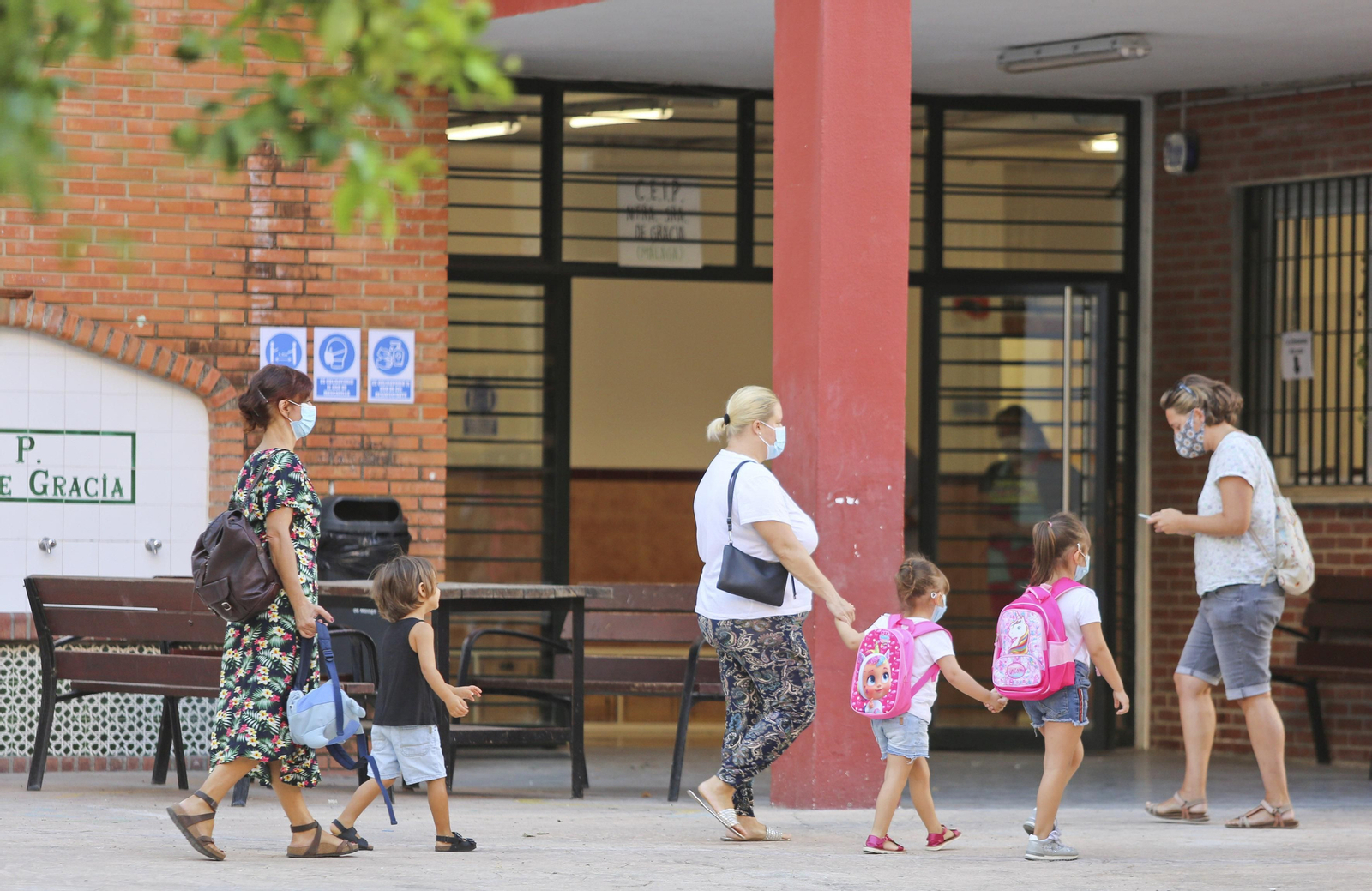 Vuelta al cole en Málaga: Fotos de un día de nervios y mascarillas