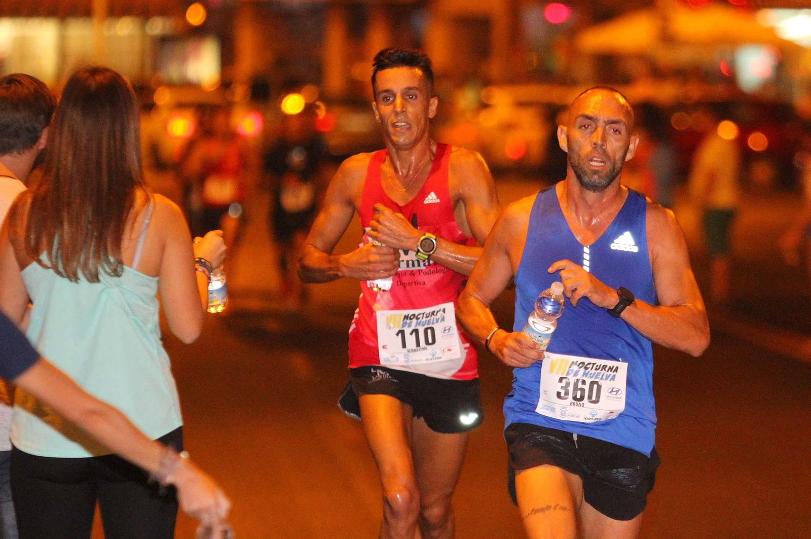 La VII Carrera Nocturna de Huelva en imágenes