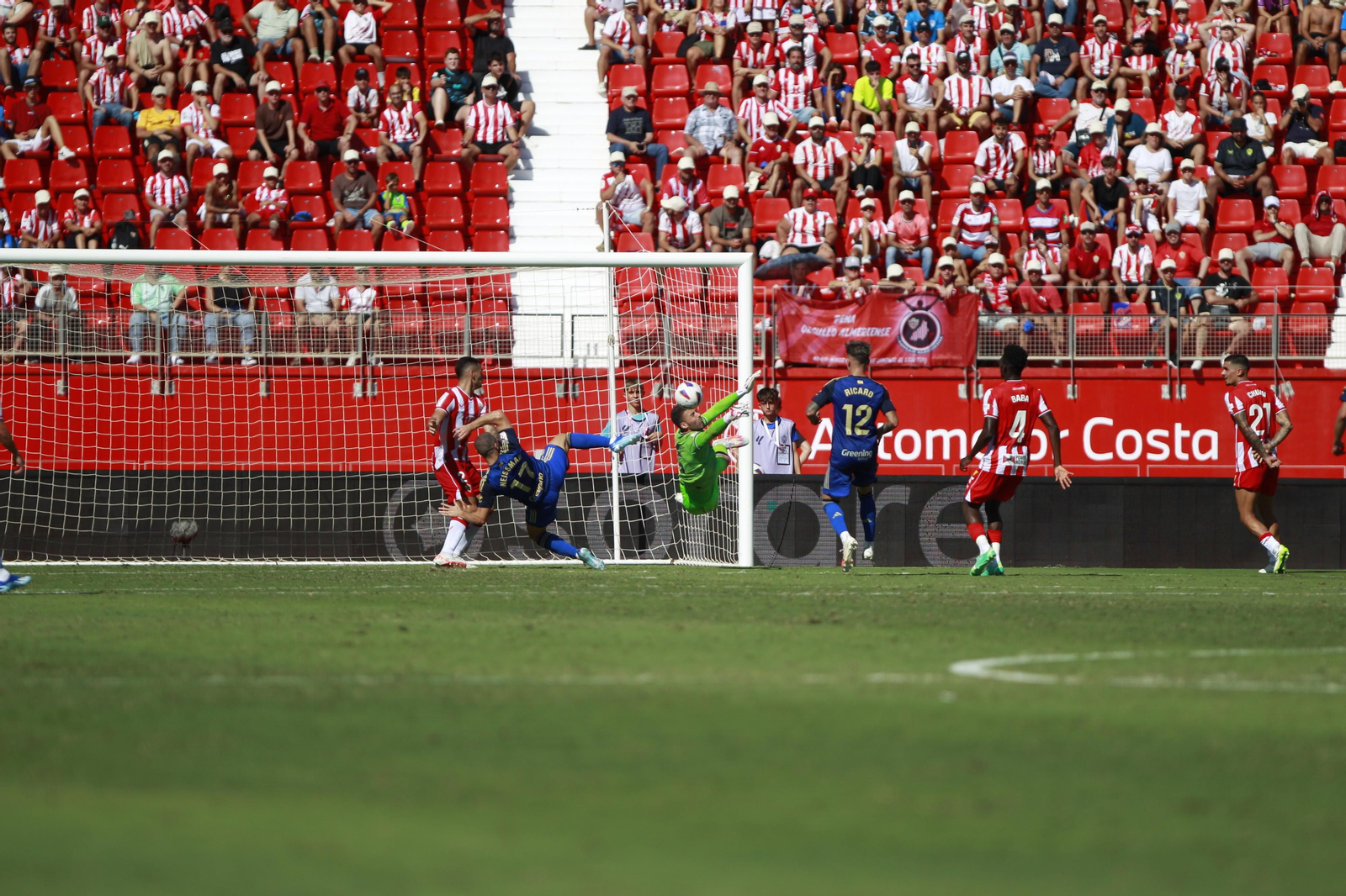 Imágenes del empate a 3 de la U.D. Almería y el Granada C.F.
