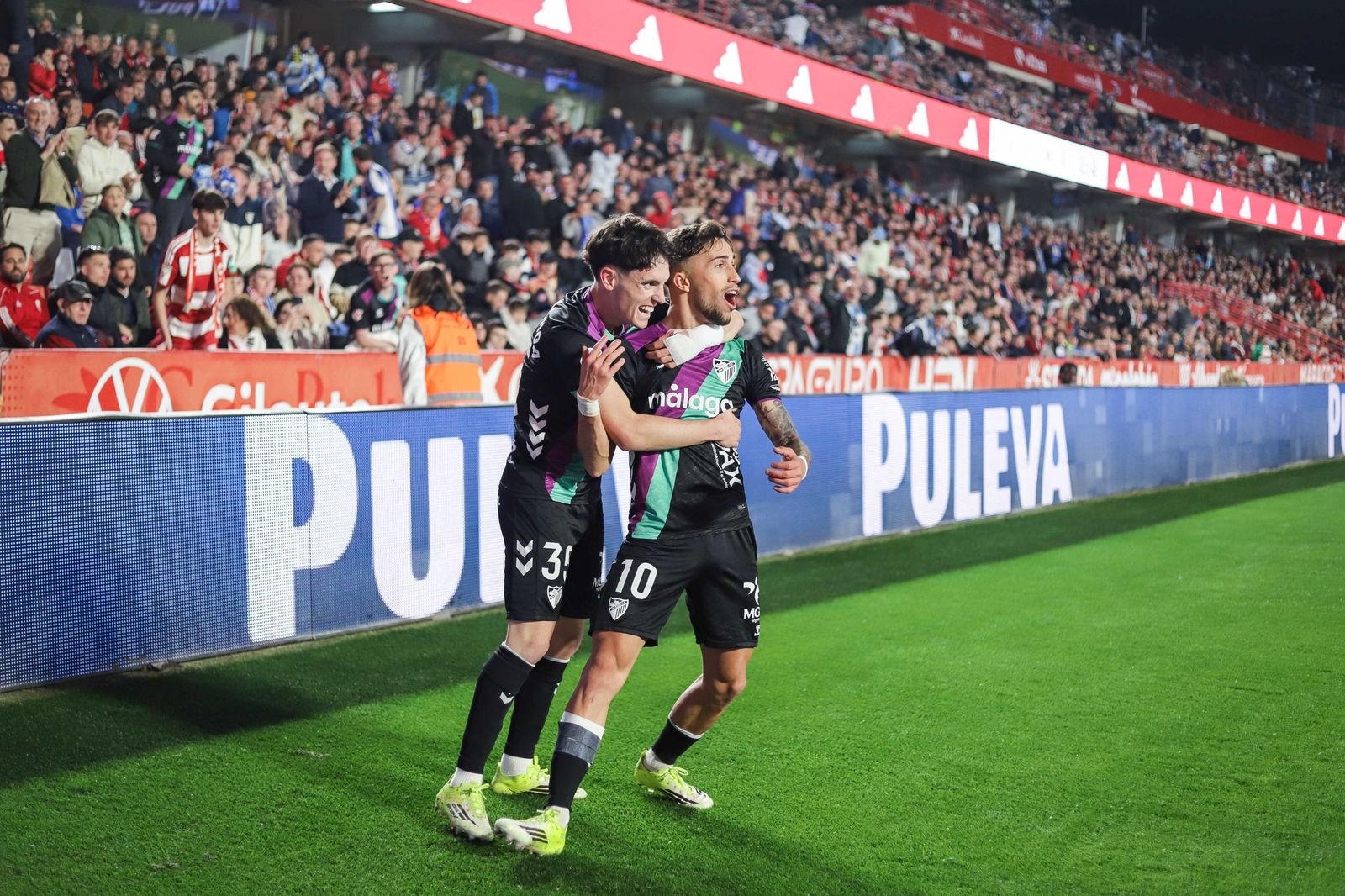 Ochoa y Larrubia celebran.