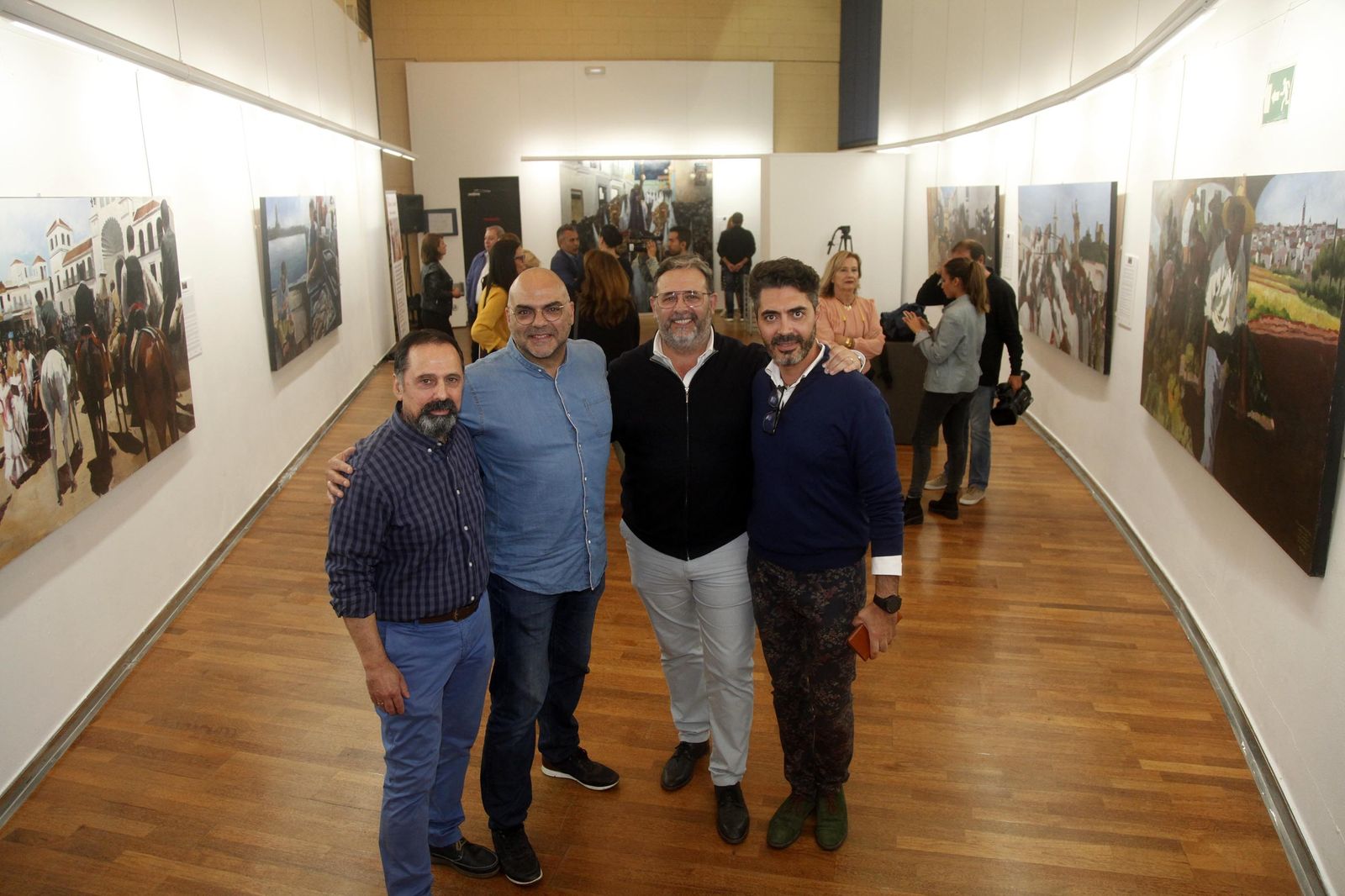 Los cuatro autores de las obras pictóricas expuestas en la galería Charo Olías de la localidad isleña.