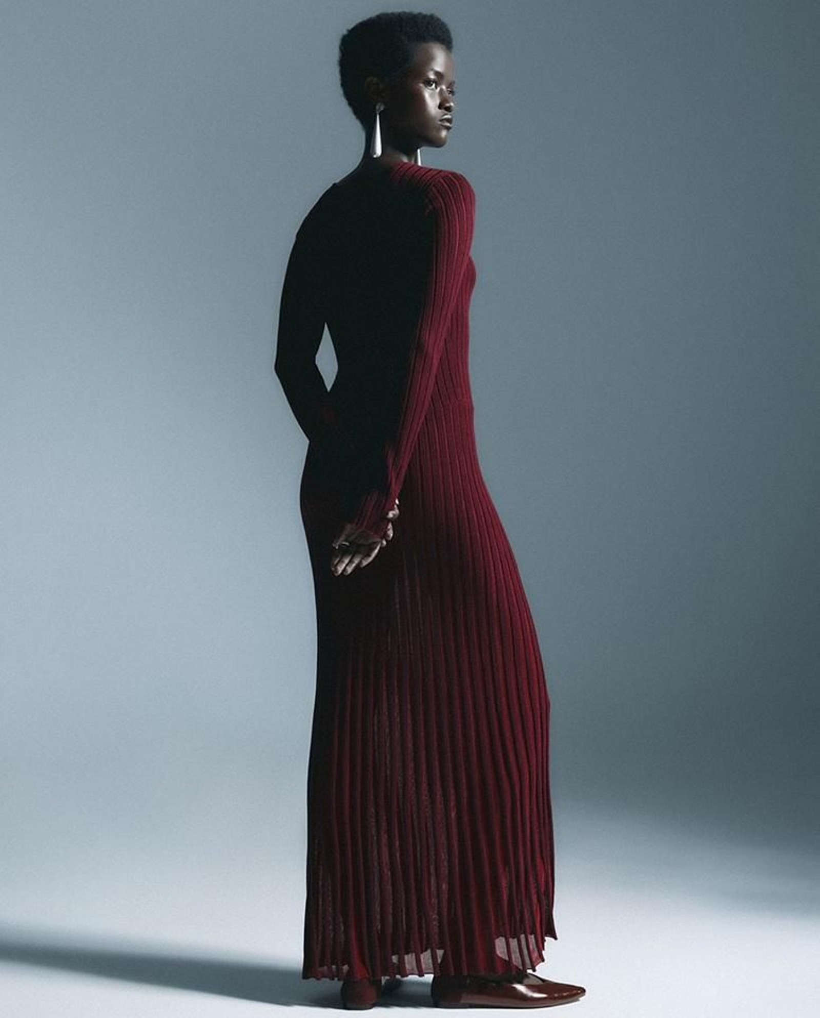 Vestido con pliegues de Sfera.