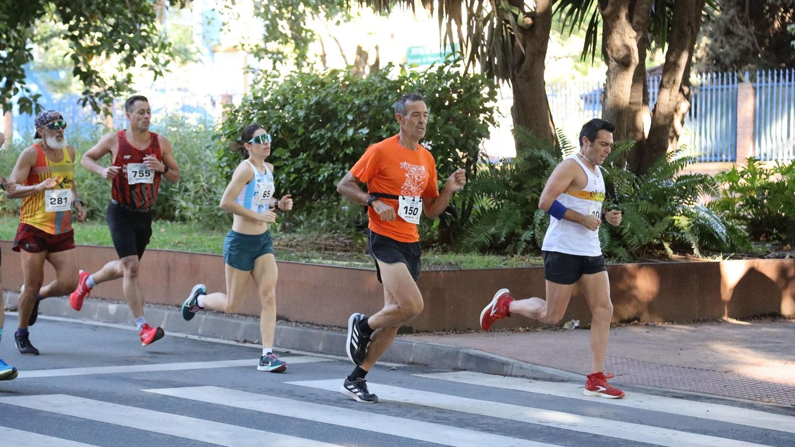 Búscate en las fotos de la Carrera de la Prensa en Málaga