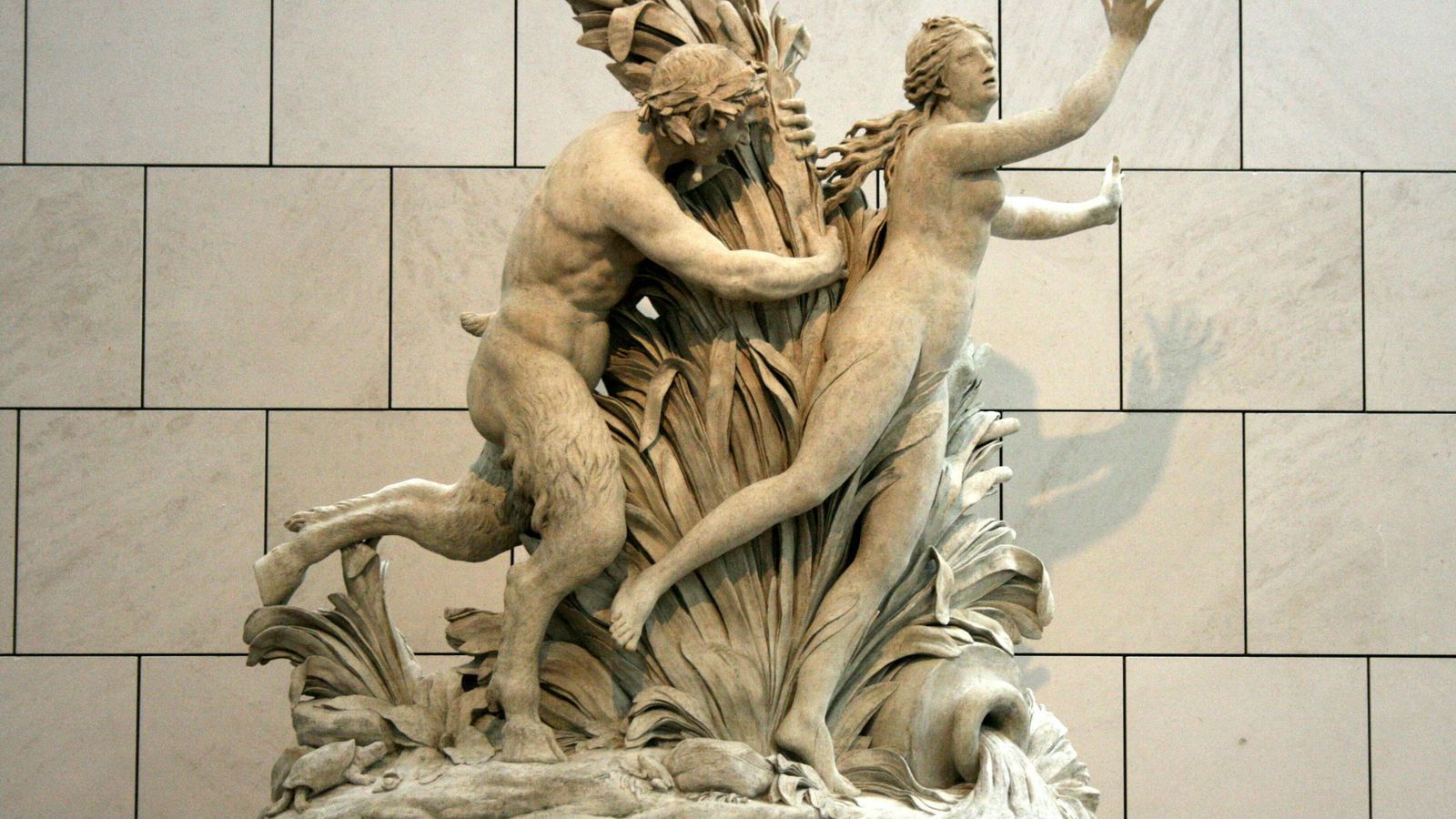 Pan persiguiendo a Siringa. Escultura de Gilles-Lambert Godecharle.
