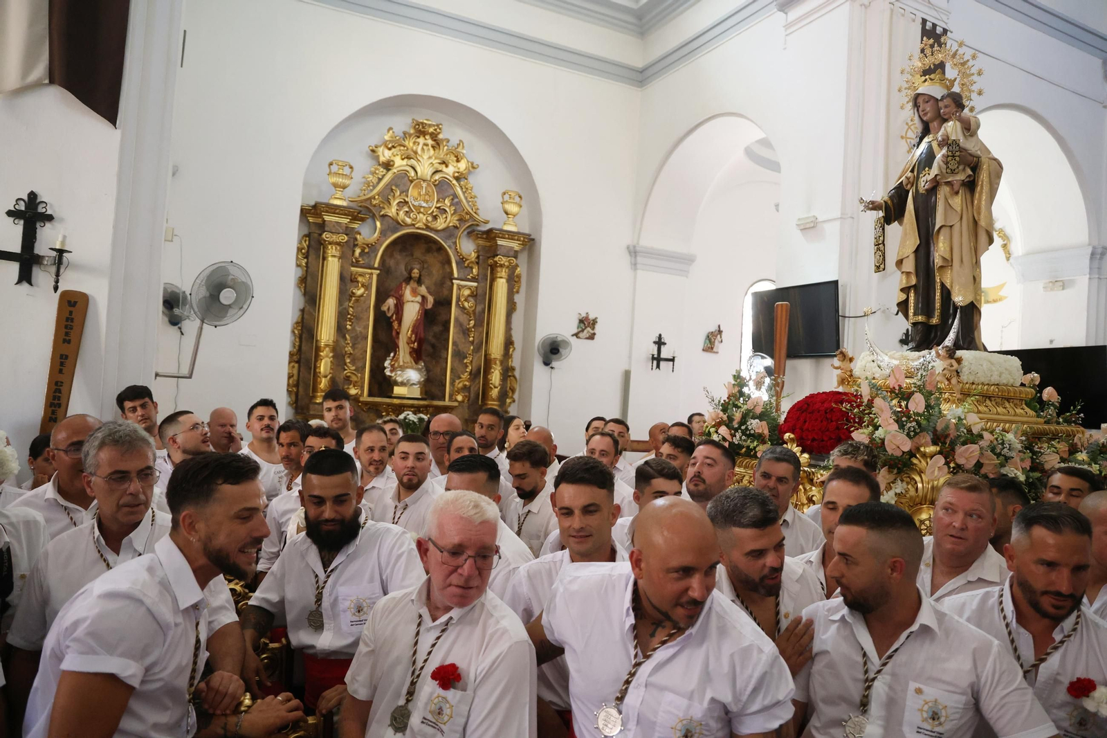La procesión de la Virgen del Carmen en El Palo, en Málaga, en imágenes
