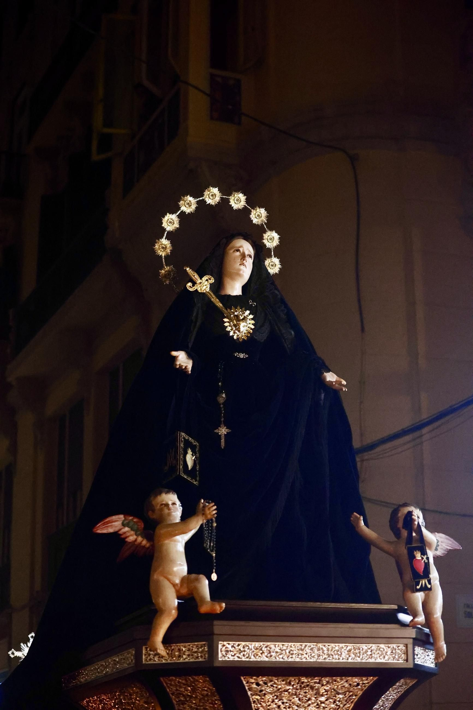 Servitas en el Viernes Santo de Málaga, en imágenes