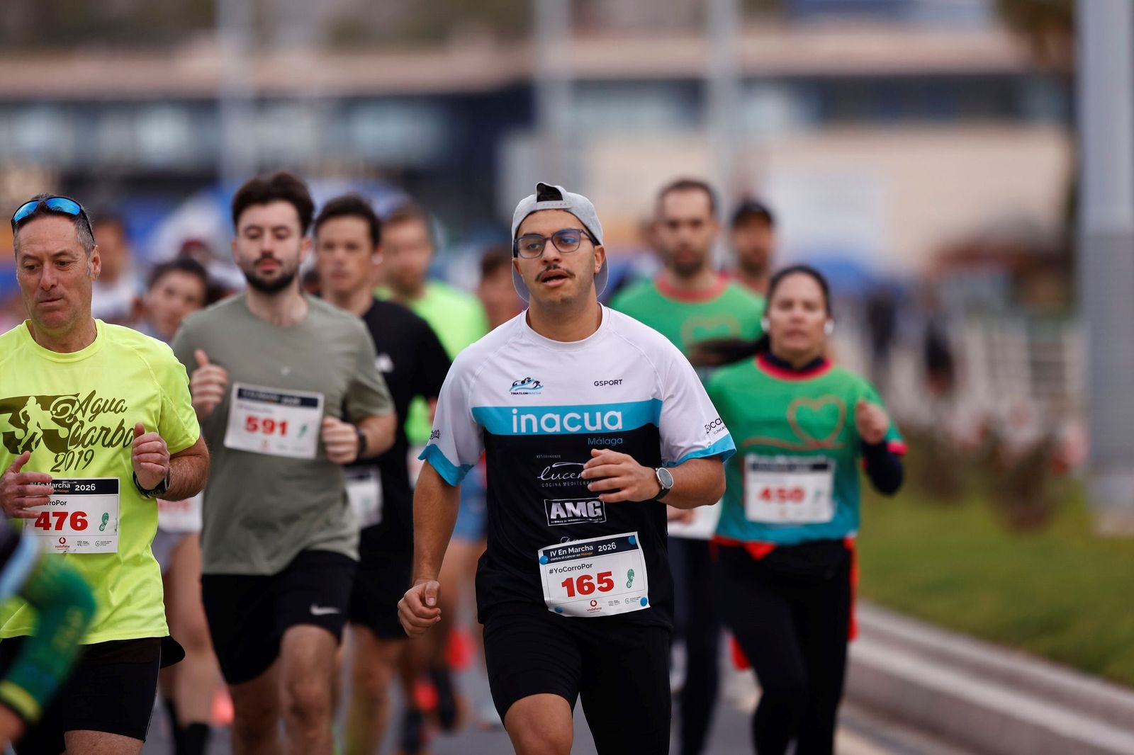 Búscate en las fotos de la Carrera contra el cáncer en Málaga