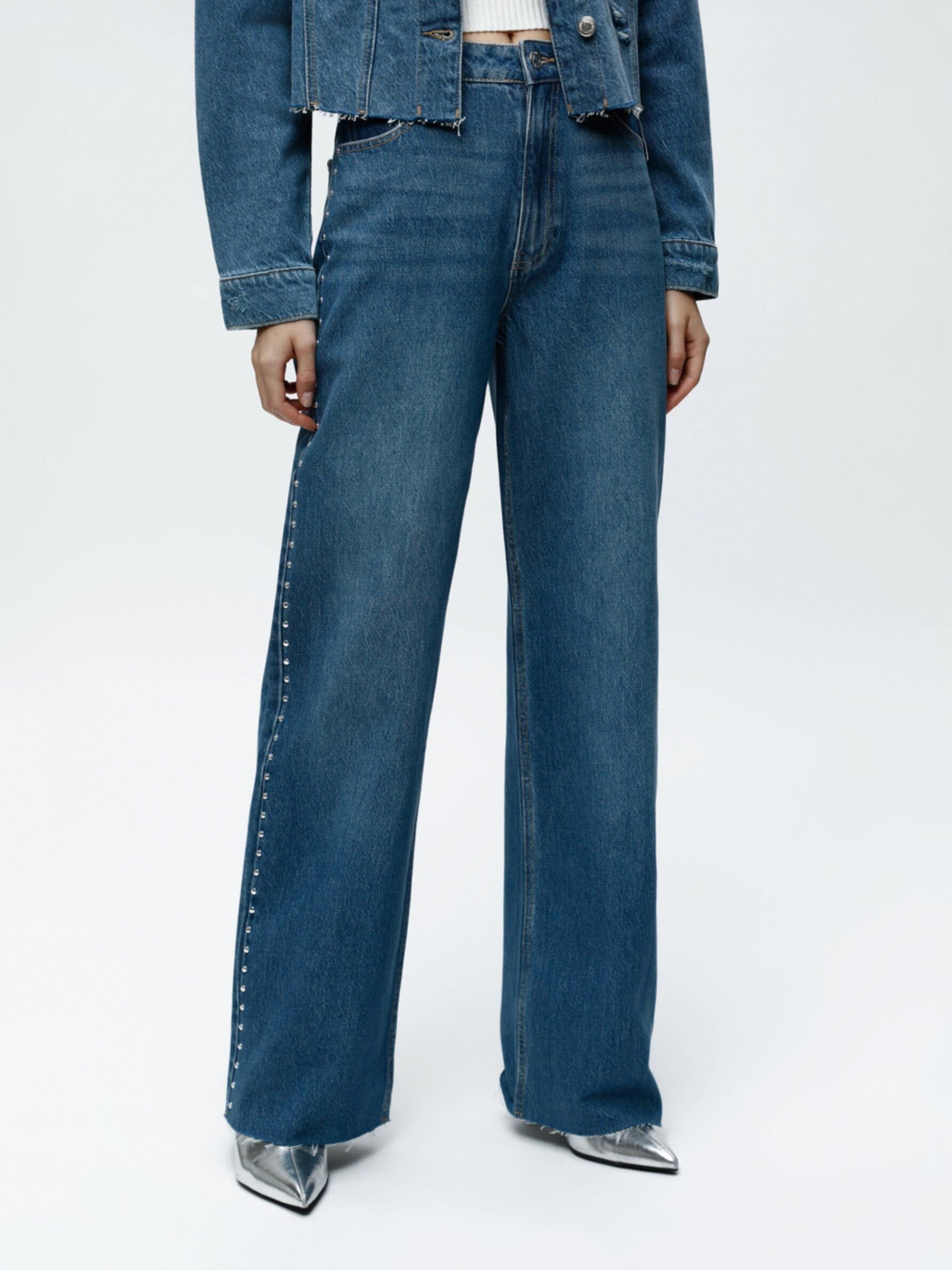 Vaqueros con tachuelas de Lefties.