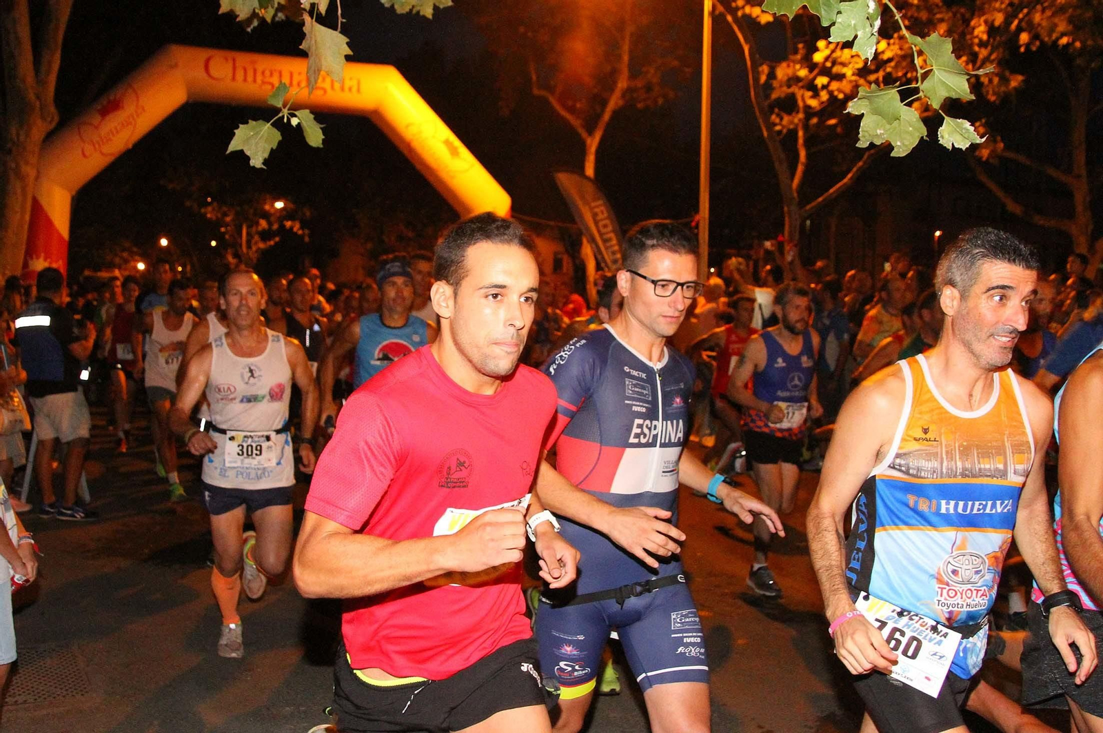La VII Carrera Nocturna de Huelva en imágenes