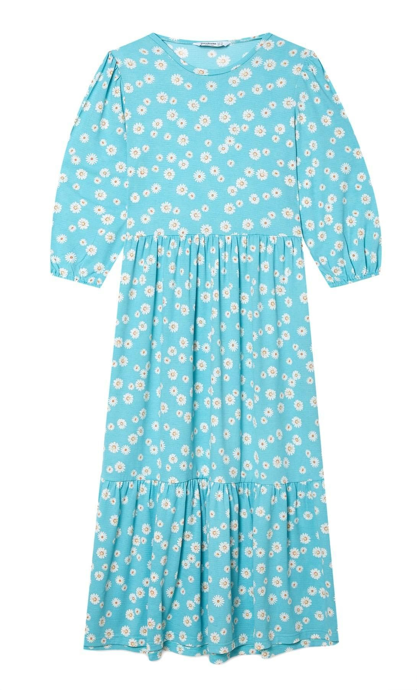Vestido de margaritas de Stradivarius.