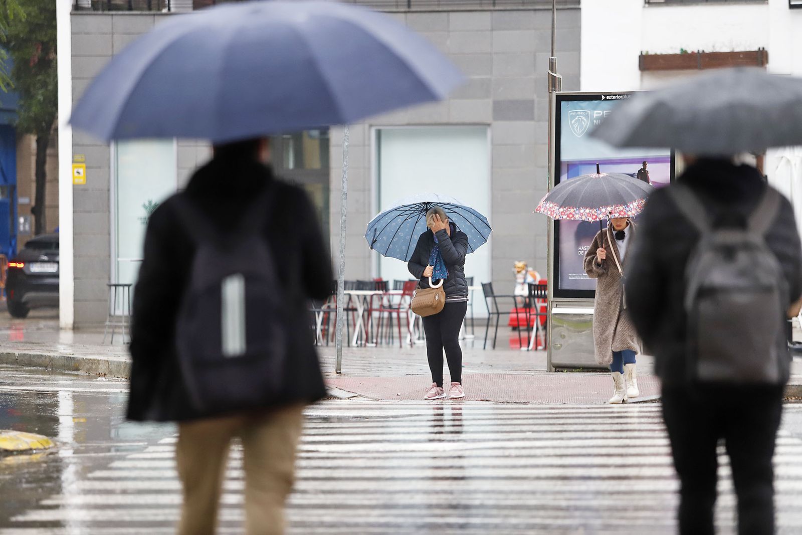 imágenes de la lluviosa mañana en Huelva