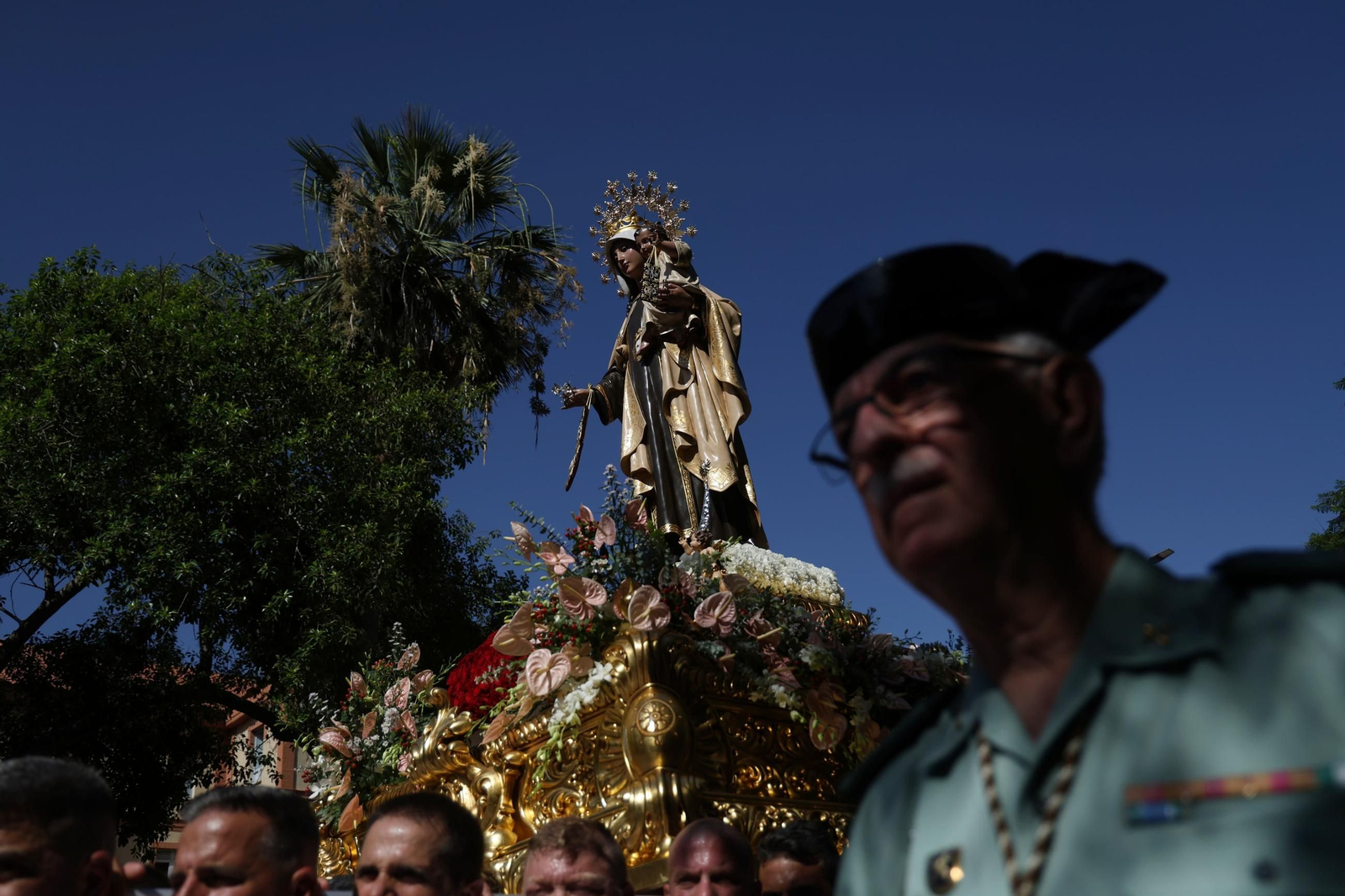 La procesión de la Virgen del Carmen en El Palo, en Málaga, en imágenes