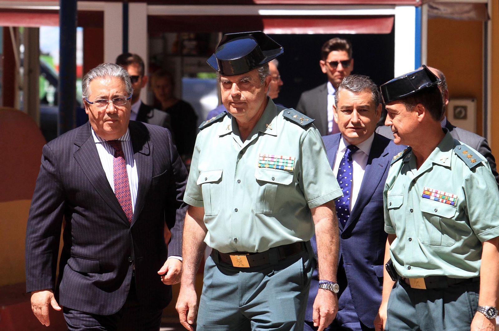 Juan Ignacio Zoido, ministro del Interior, presenta en la Comandancia de la Guardia Civil la nueva versión de AleryCops y el dispositivo del Rocío y posteriormente acude a la Diputación de Huelva para visitar la exposición sobre el terrorismo, en imágenes