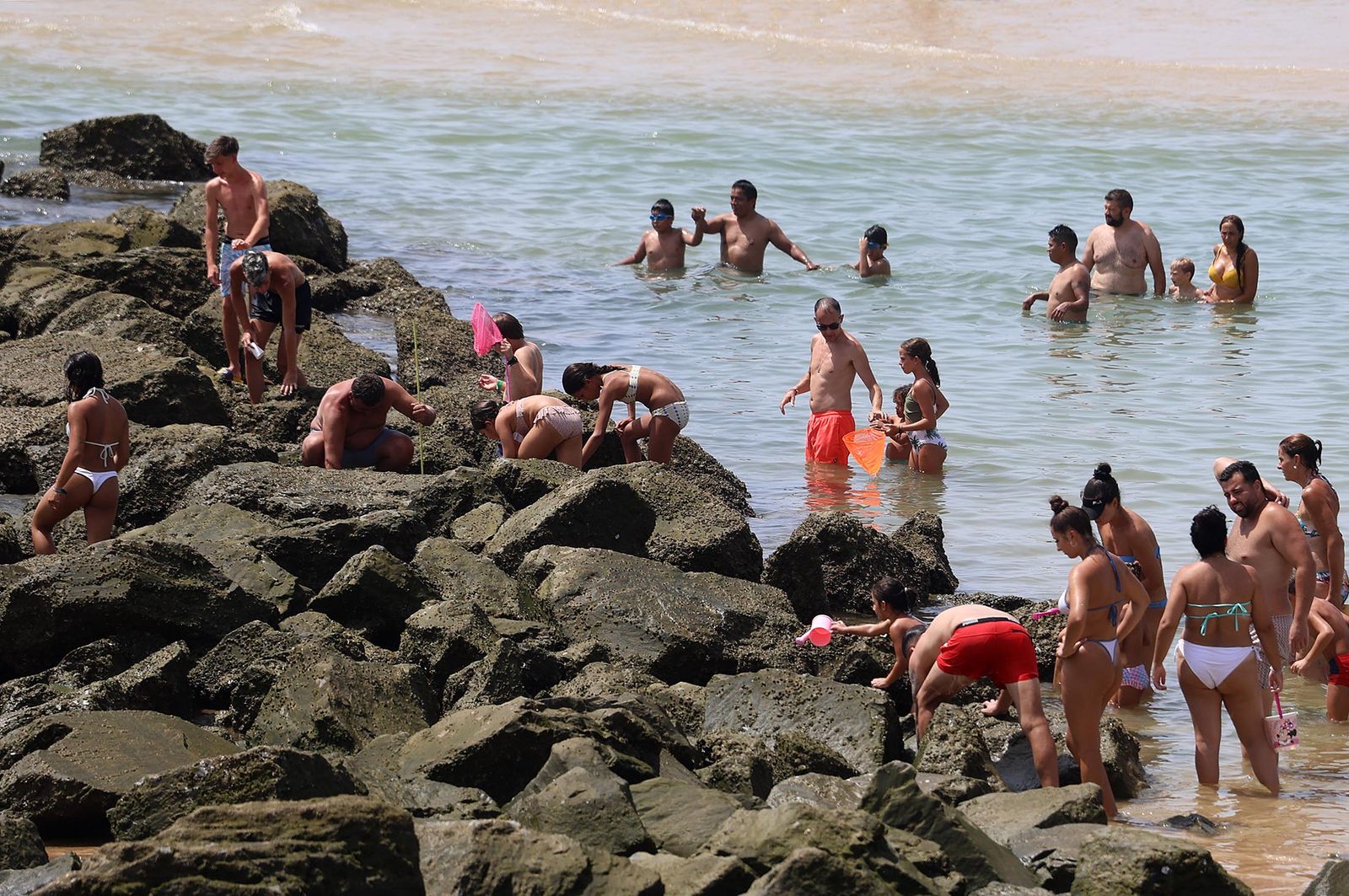 Imágenes del caluroso día en la playa de Matalascañas