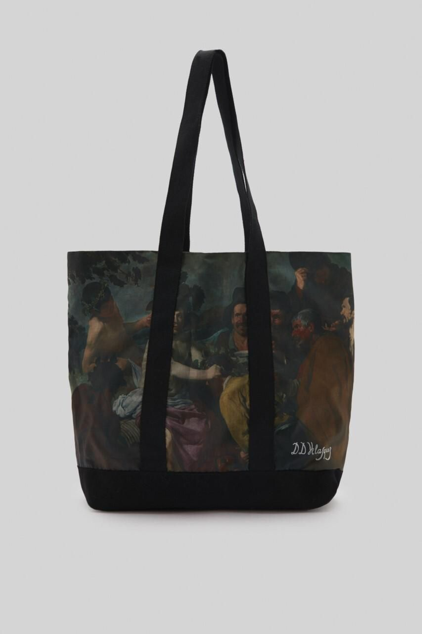 El bolso, tipo 'shopper', que reproduce el cuadro conocido como 'Los borrachos'.