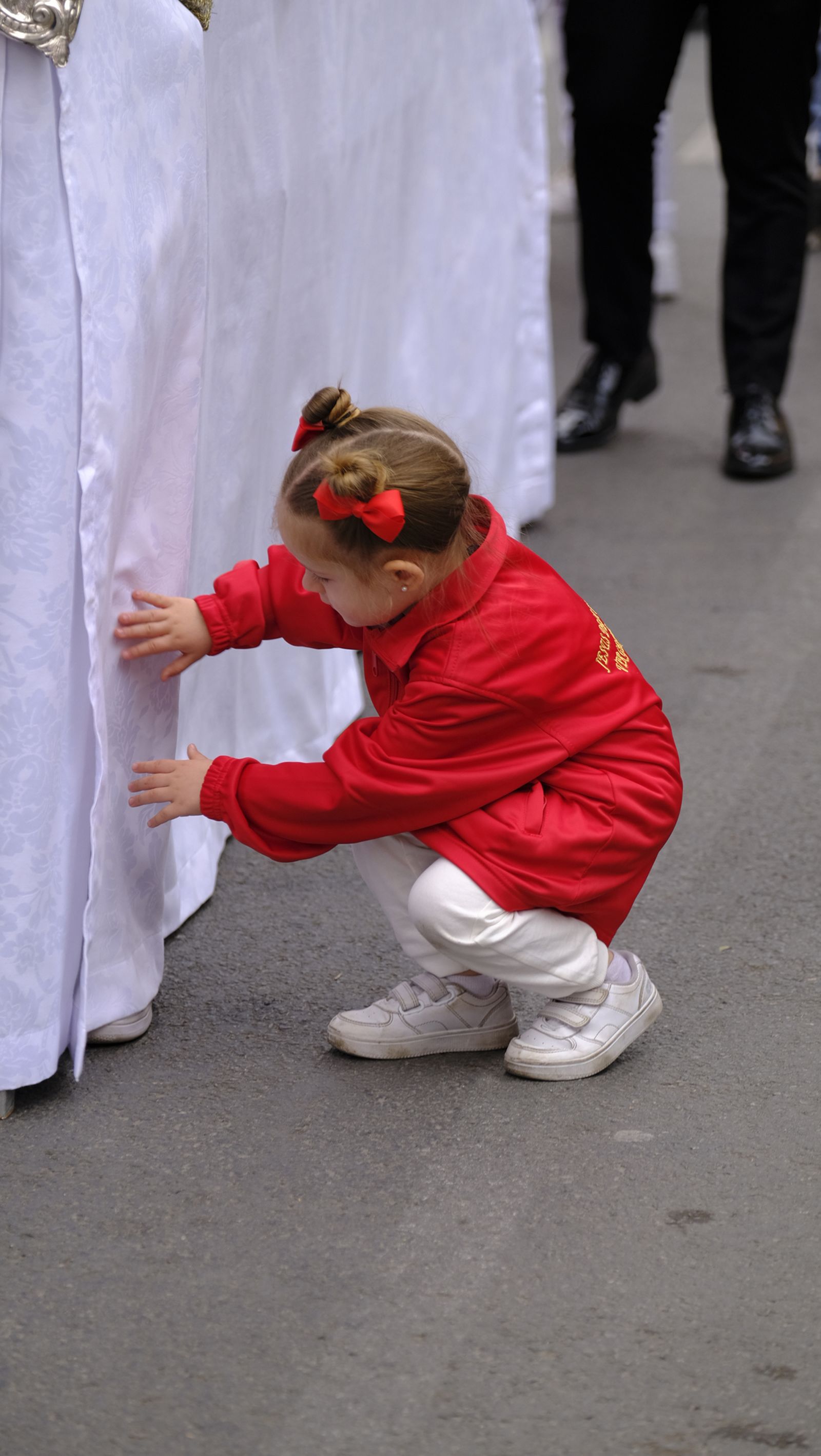 La Borriquita procesiona por las calles de Almería, en imágenes