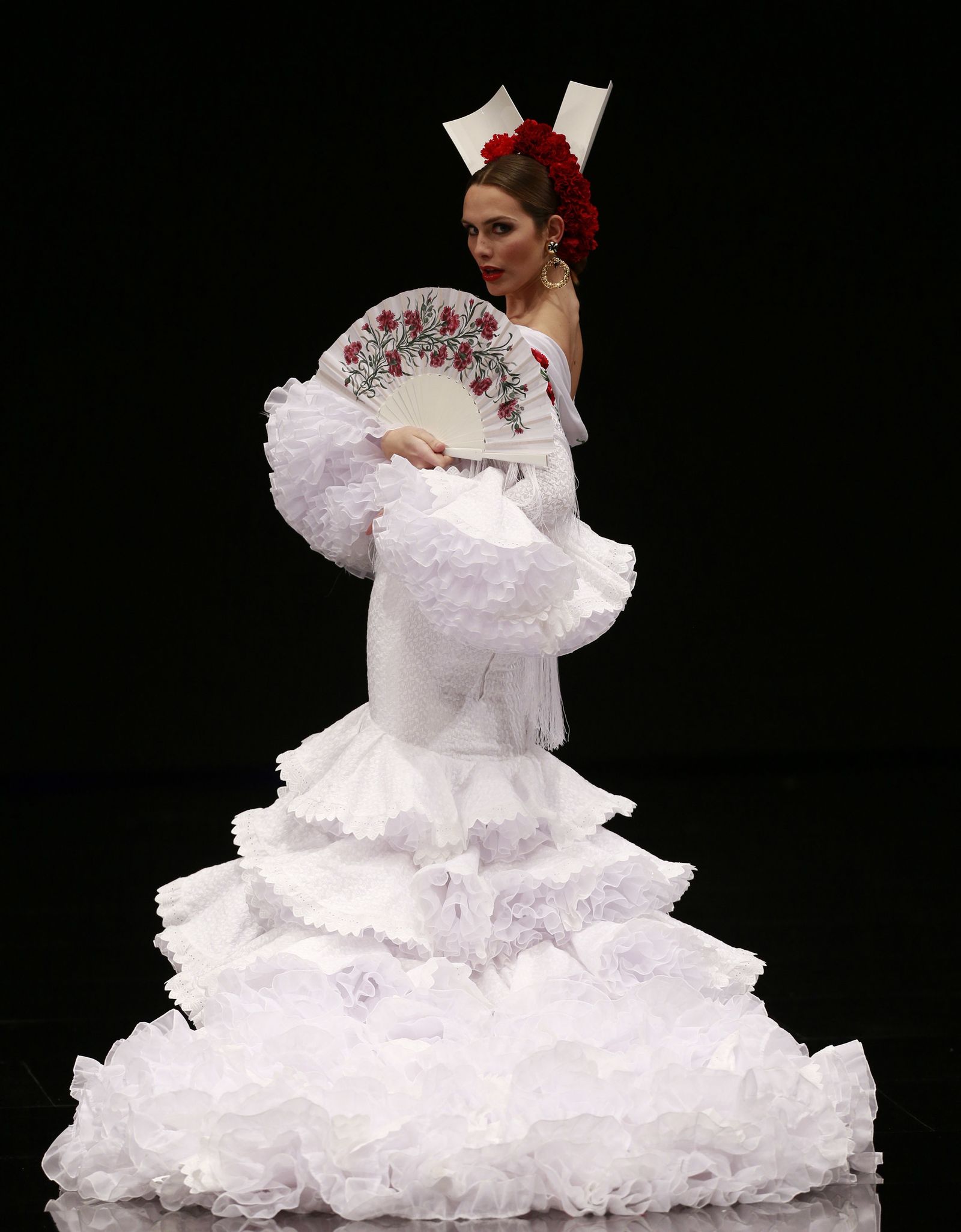 Desfile de Luis Fernández.