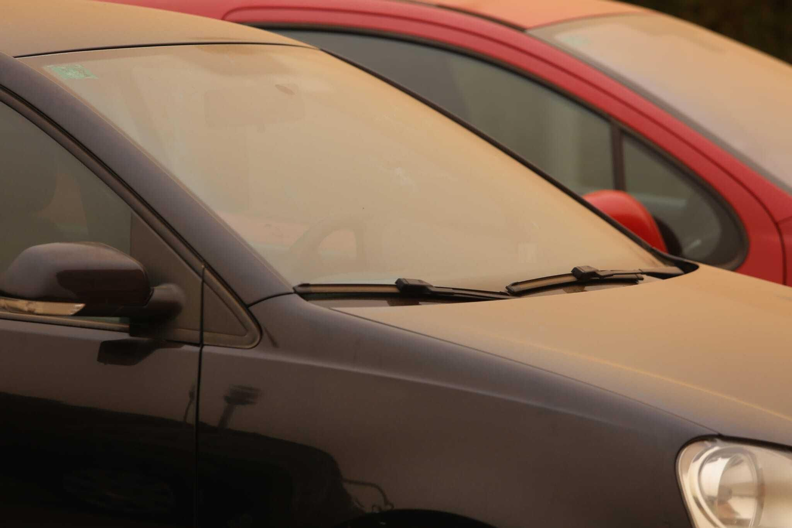Fotos del efecto de la calima en Málaga y en sus coches