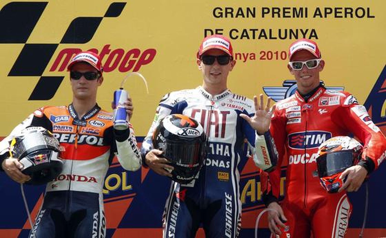 Podio de MotoGp con Pedrosa (i), Lorenzo (c) y Stoner.

Foto: reuters