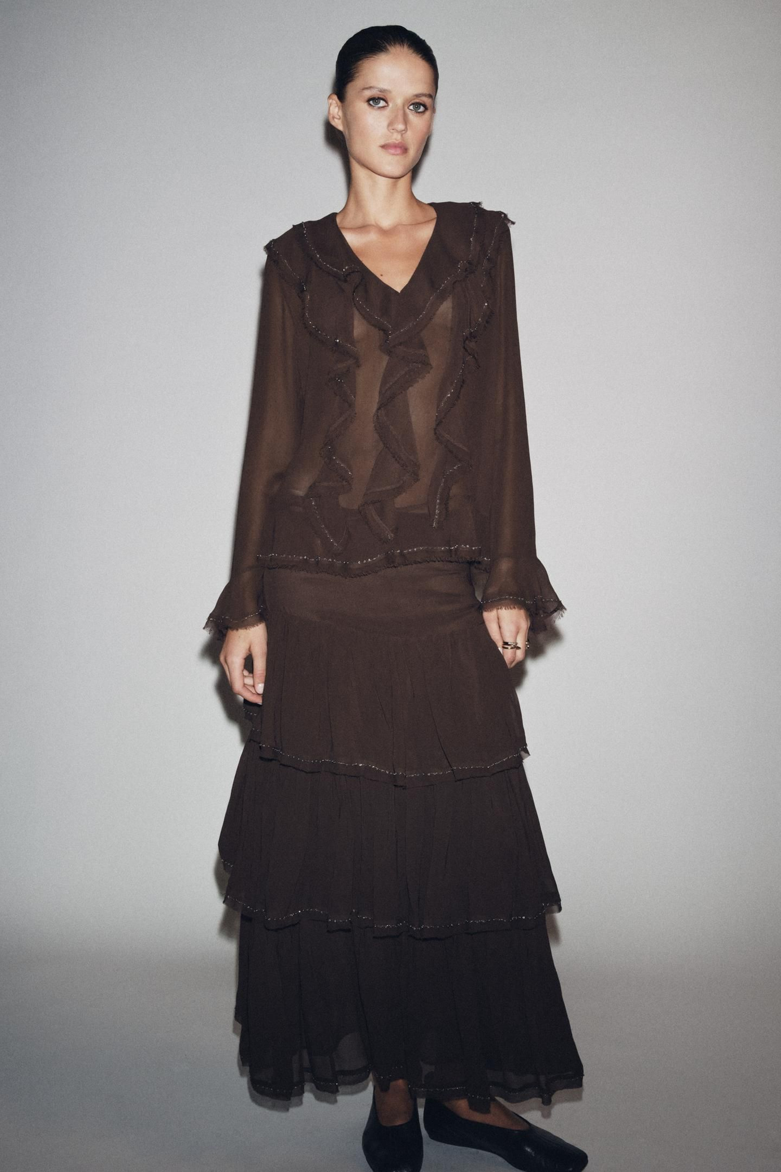 Blusa con volantes de Zara.